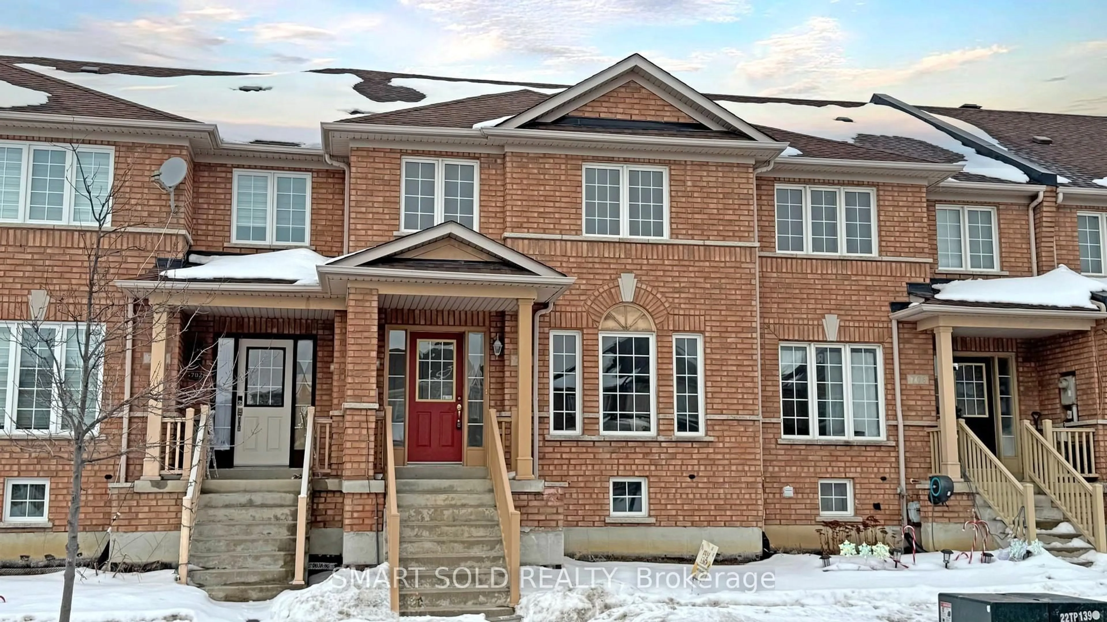 Home with brick exterior material, street for 704 Castlemore Ave, Markham Ontario L6E 1M9