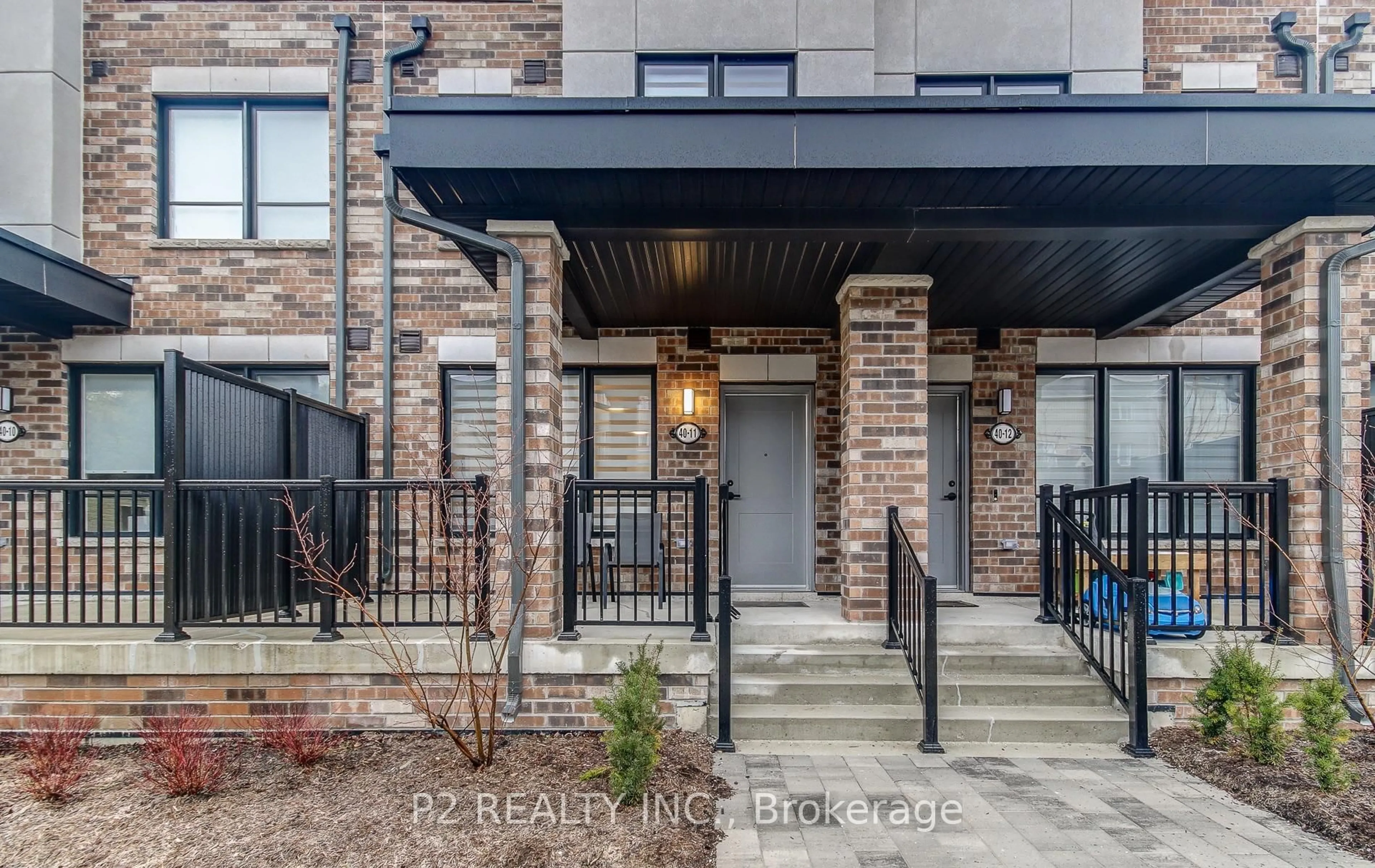 Home with brick exterior material, street for 40 Baynes Way #11, Bradford West Gwillimbury Ontario L3Z 4M4