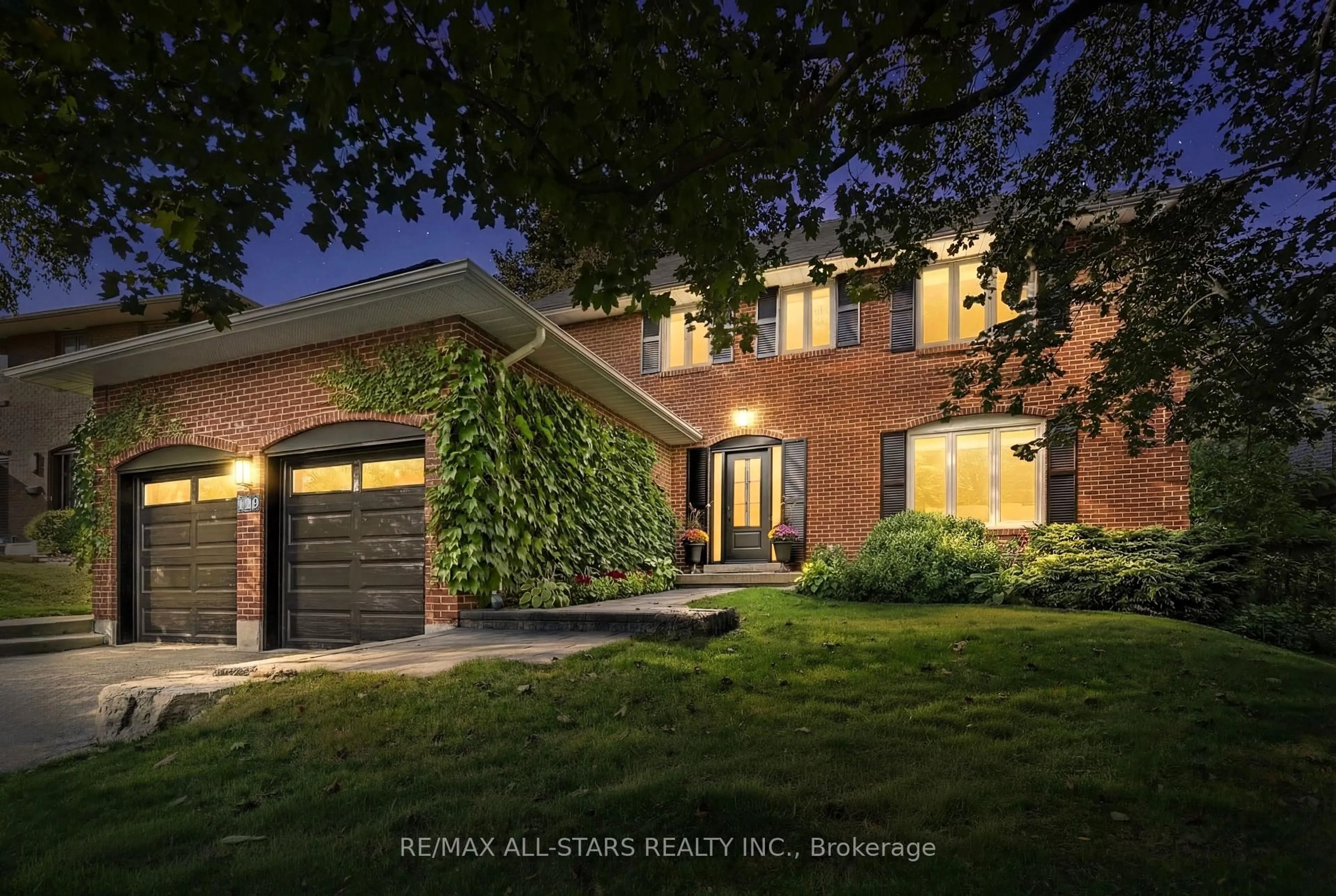 Home with brick exterior material, street for 129 Briarwood Rd, Markham Ontario L3R 2X1