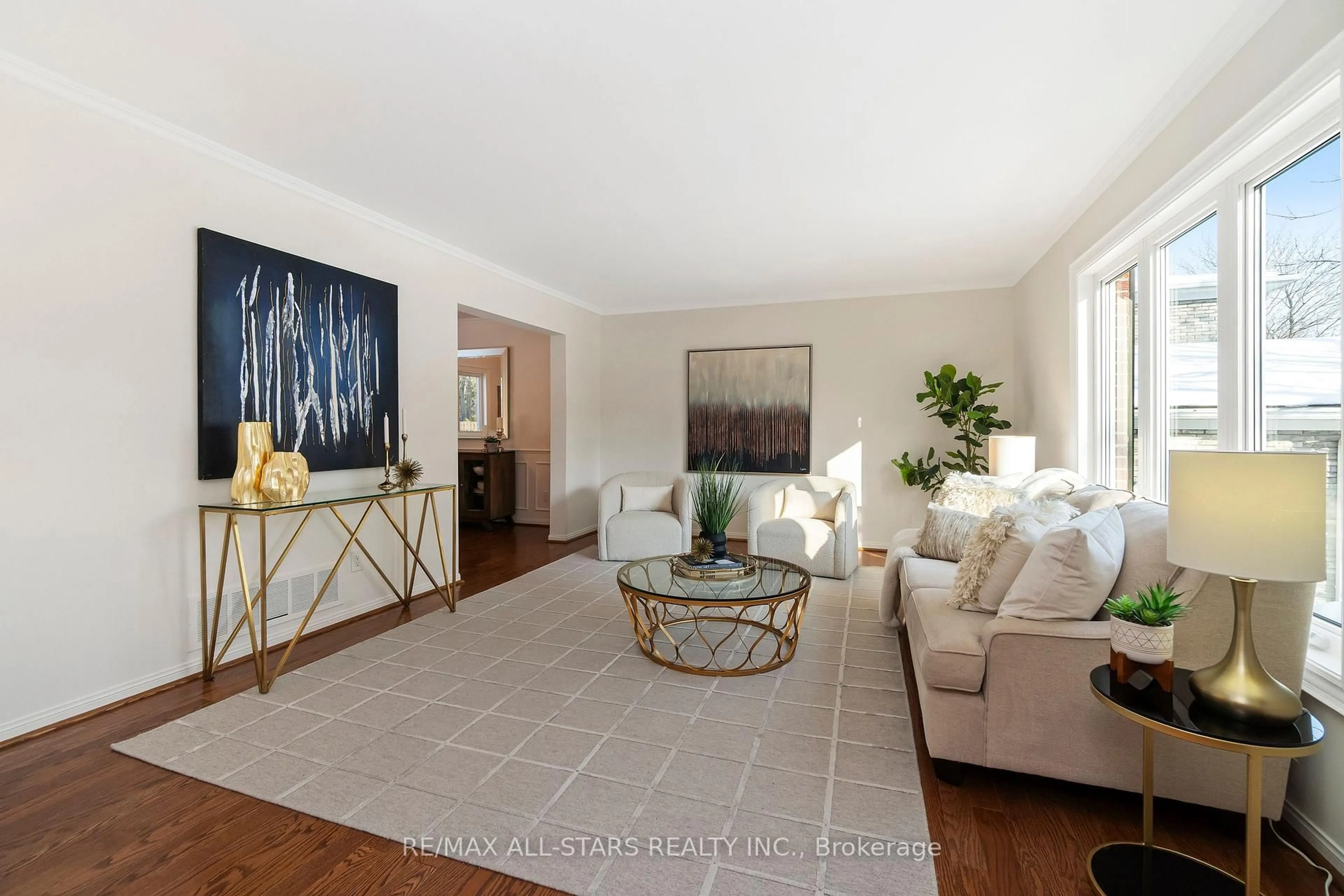 Living room with furniture, unknown for 129 Briarwood Rd, Markham Ontario L3R 2X1