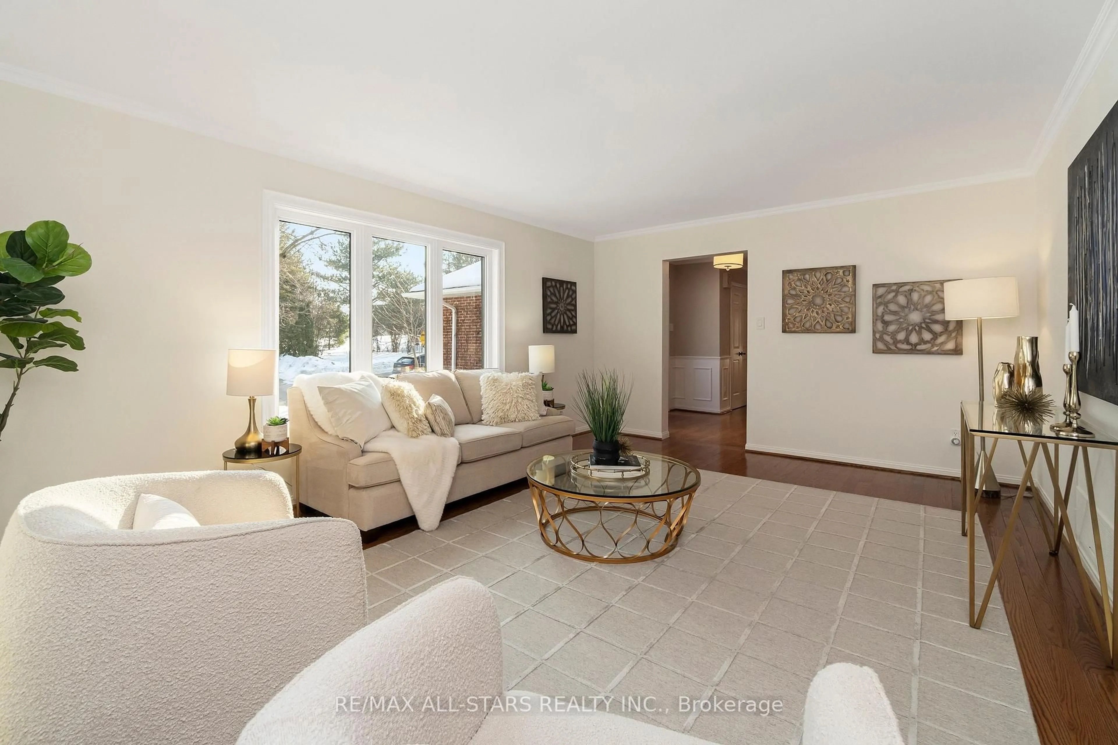 Living room with furniture, unknown for 129 Briarwood Rd, Markham Ontario L3R 2X1