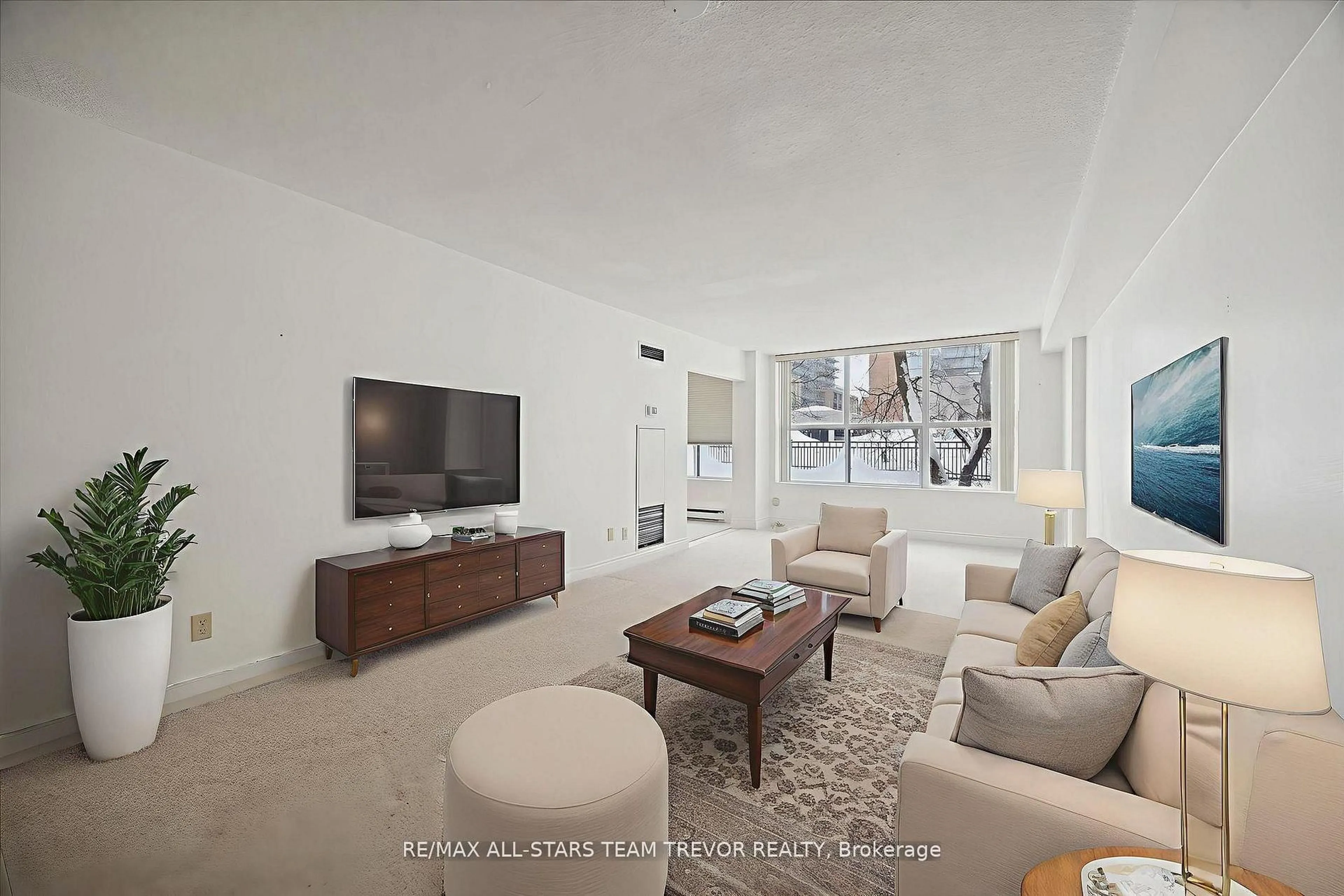 Living room with furniture, unknown for 250 Davis Dr #204, Newmarket Ontario L3Y 7T7