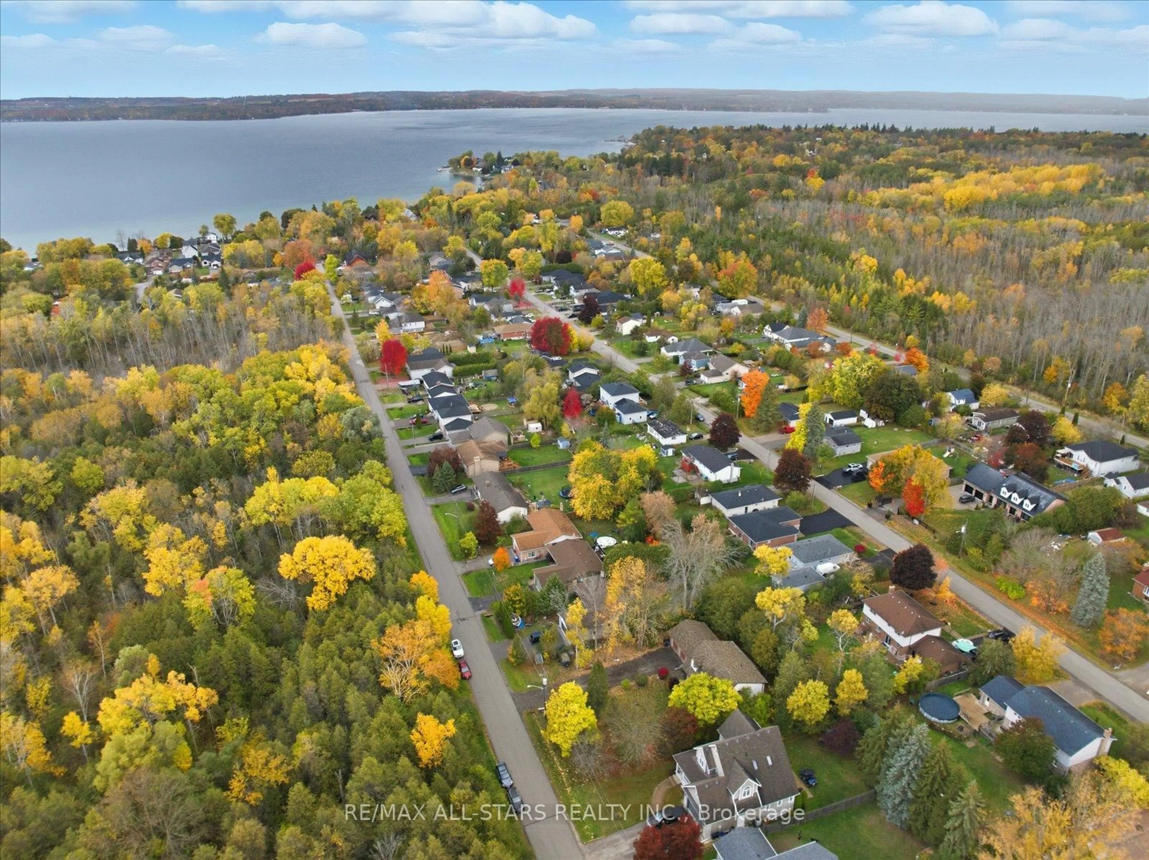 A pic from outside/outdoor area/front of a property/back of a property/a pic from drone, water/lake/river/ocean view for 62 Evelyn Ave, Georgina Ontario L4P 3C8
