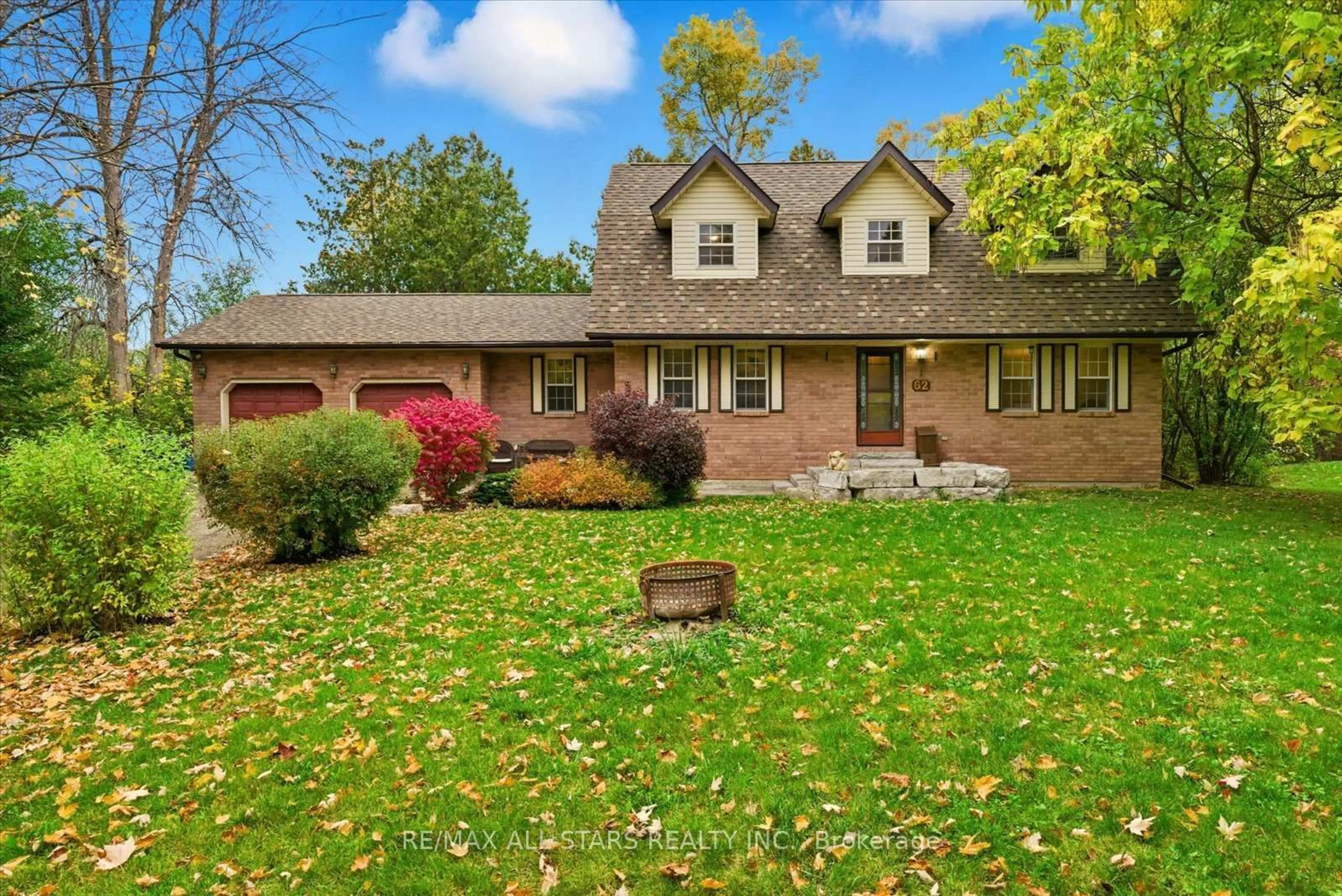 Home with brick exterior material, street for 62 Evelyn Ave, Georgina Ontario L4P 3C8