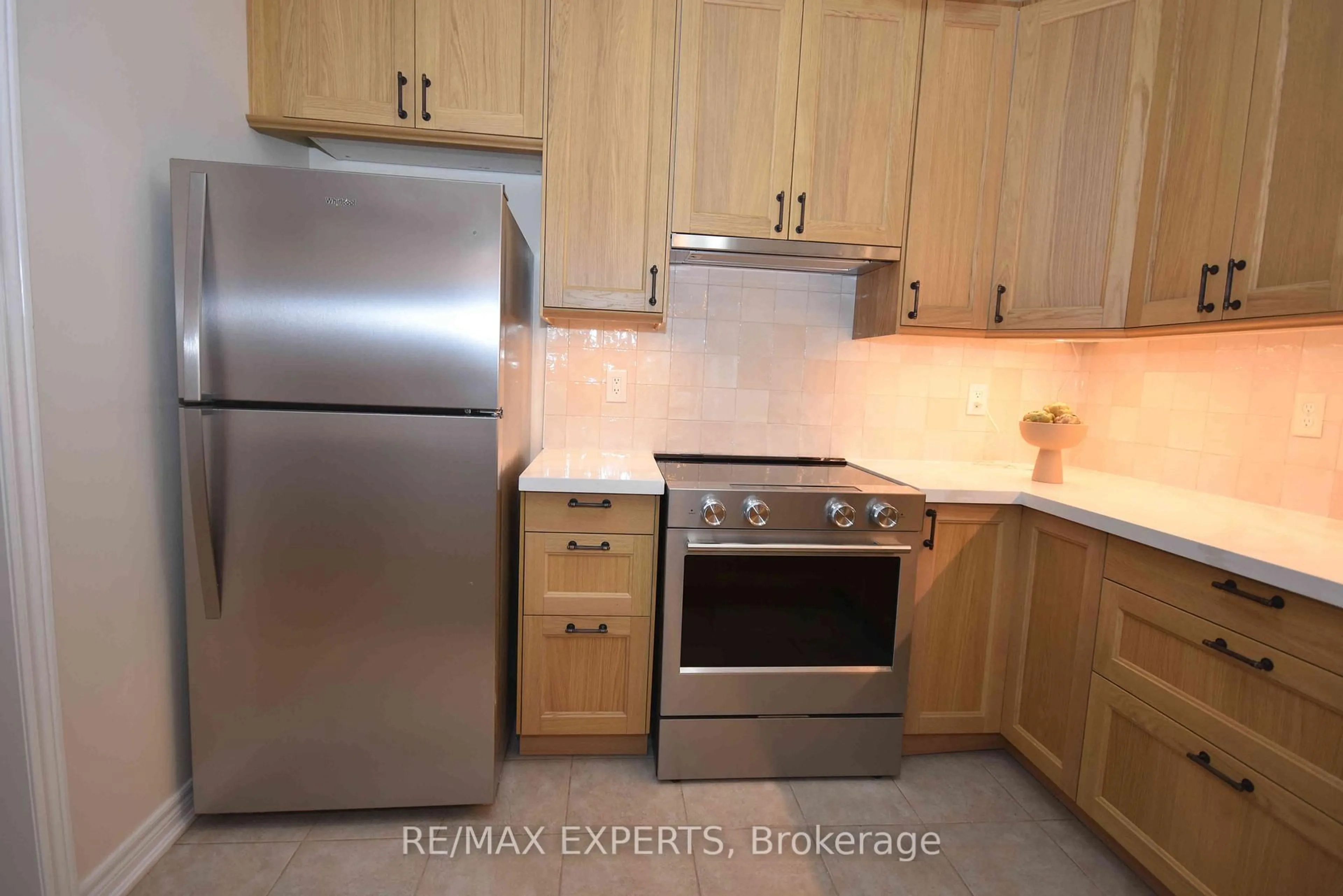 Standard kitchen, wood/laminate floor for 57 Drew Kelly Way #7, Markham Ontario L3R 5R2