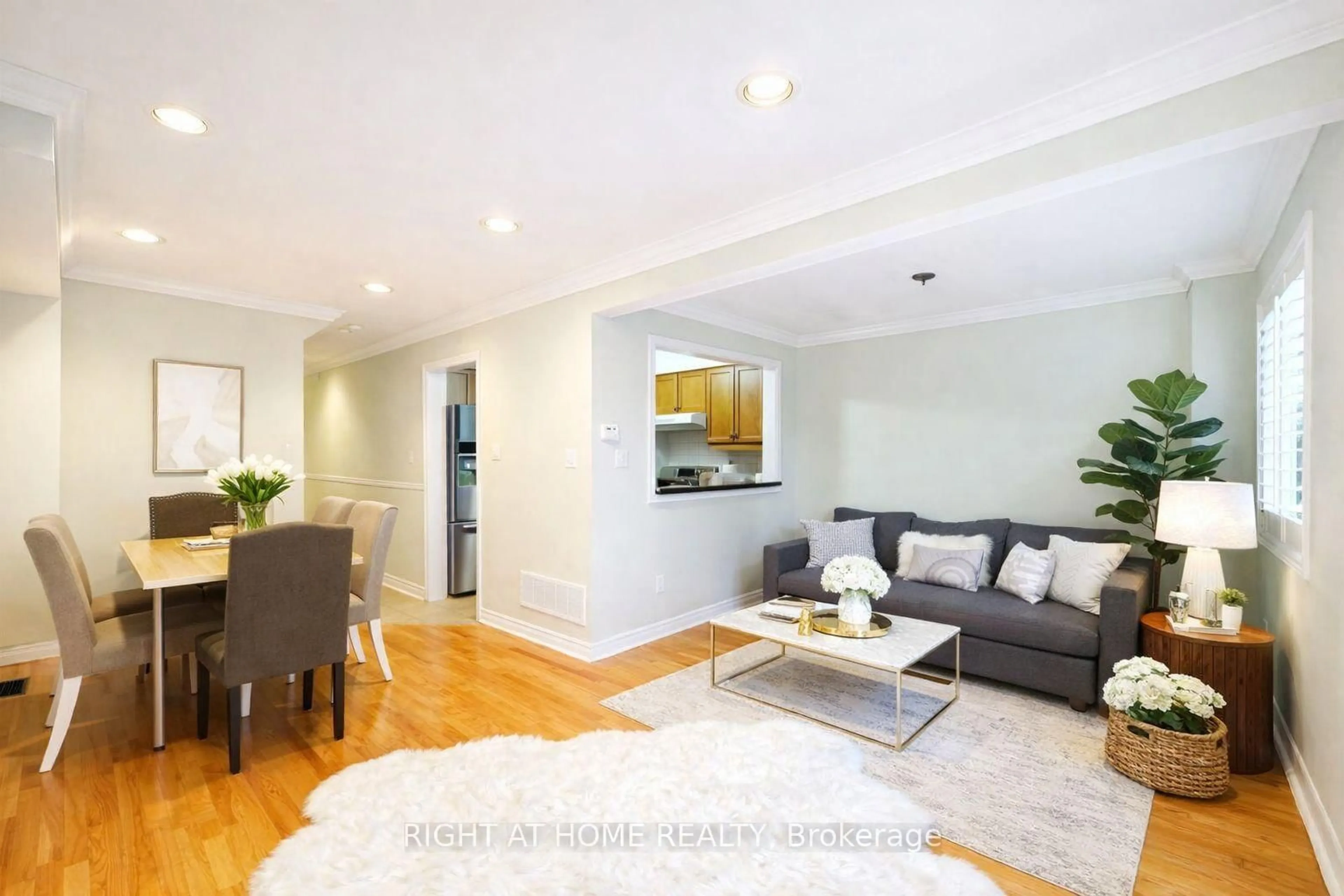 Living room with furniture, wood/laminate floor for 95 Giancola Cres, Vaughan Ontario L6A 2T5