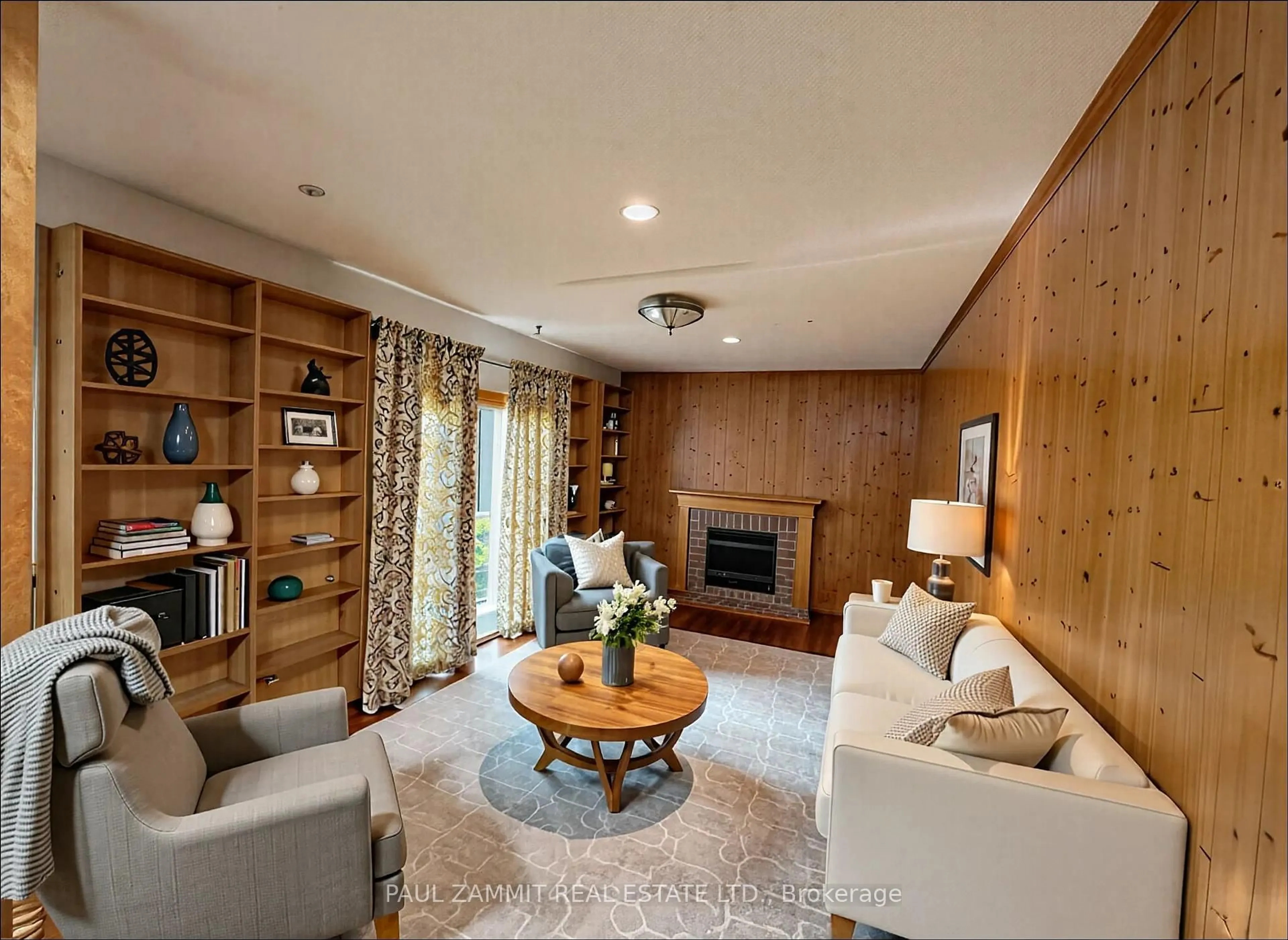 Living room with furniture, wood/laminate floor for 114 Babcombe Dr, Markham Ontario L3T 1N1