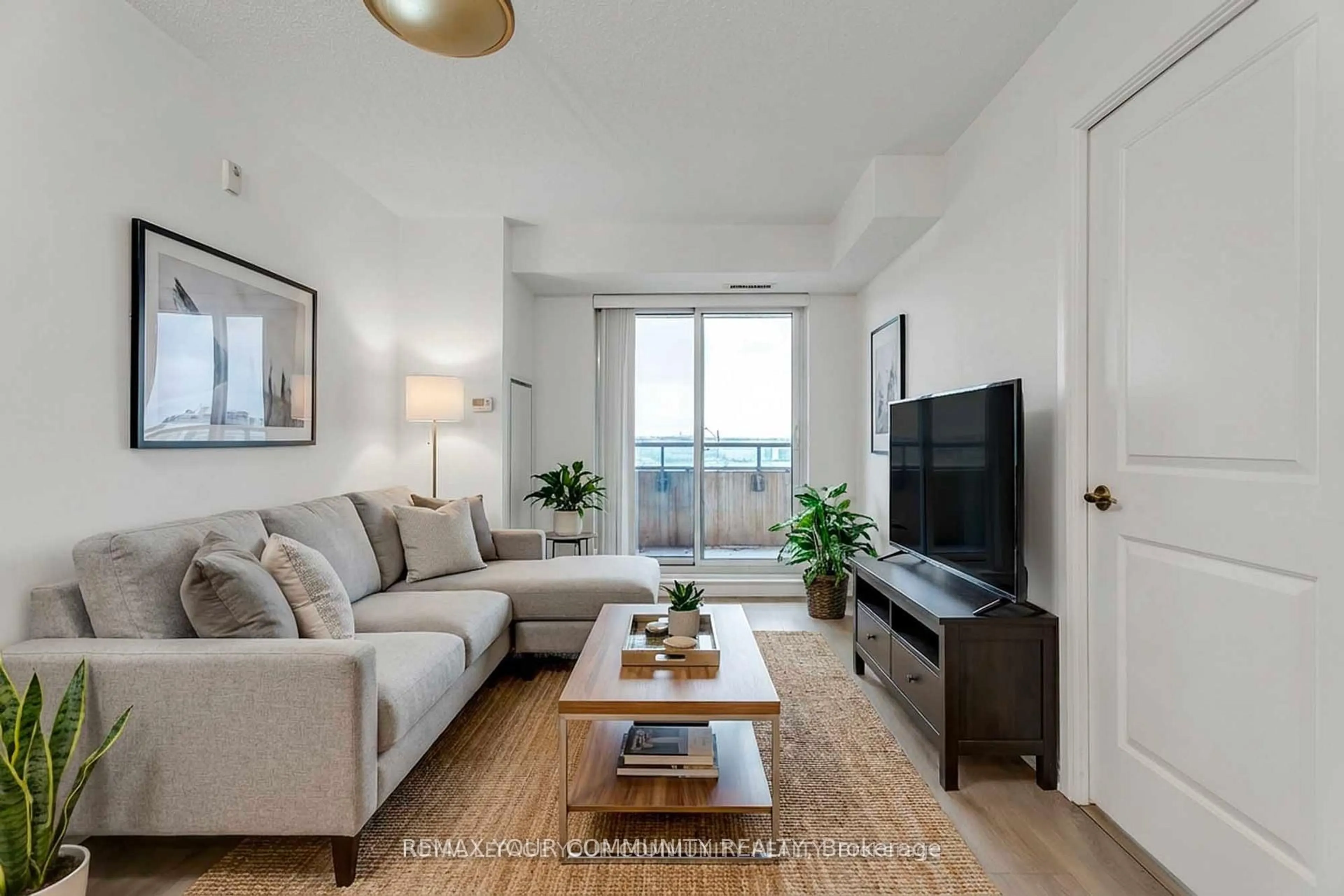 Living room with furniture, wood/laminate floor for 75 Norman Bethune Ave #420, Richmond Hill Ontario L4B 3L4