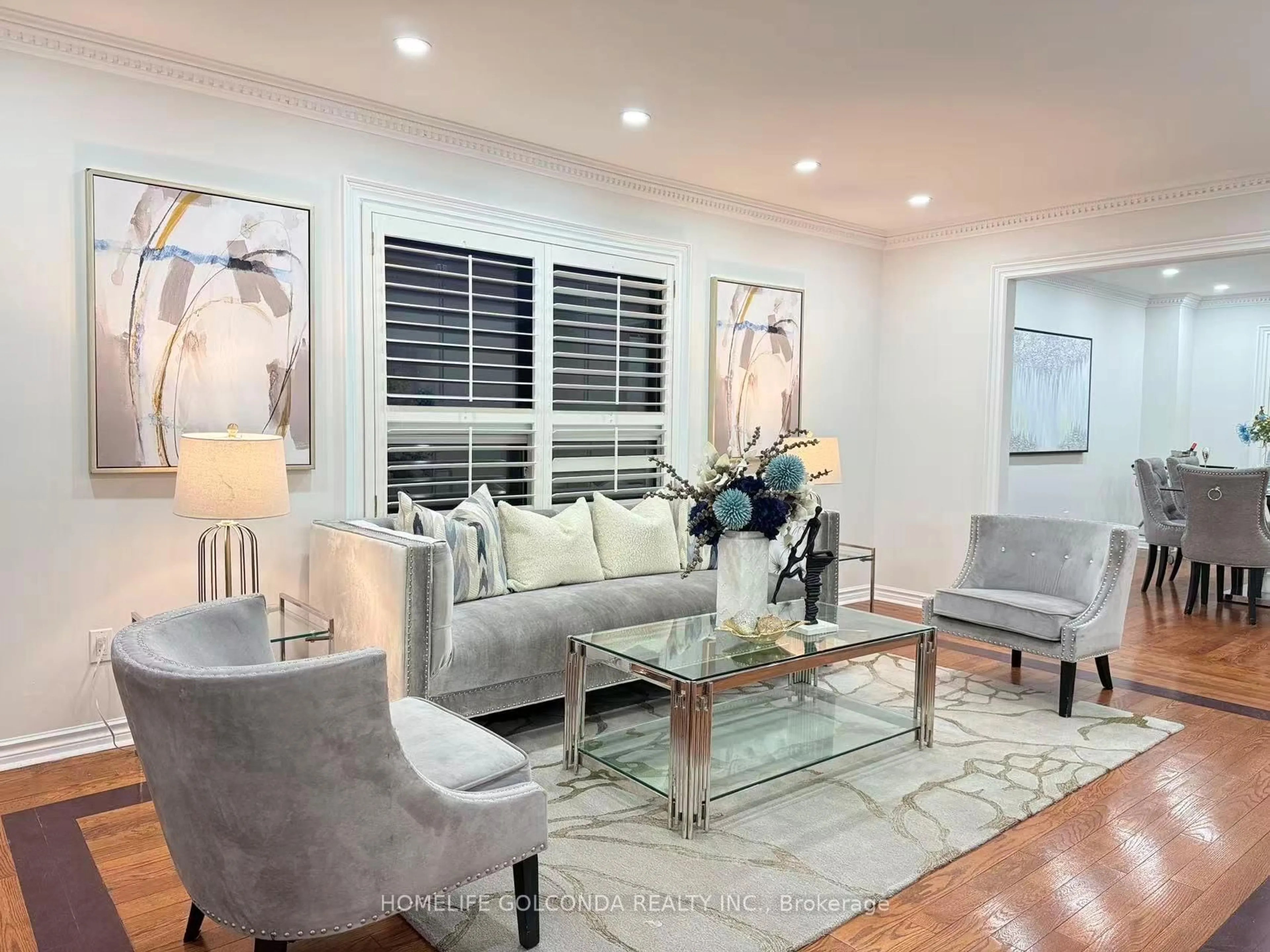 Living room with furniture, wood/laminate floor for 29 Randall Ave, Markham Ontario L3S 1J8