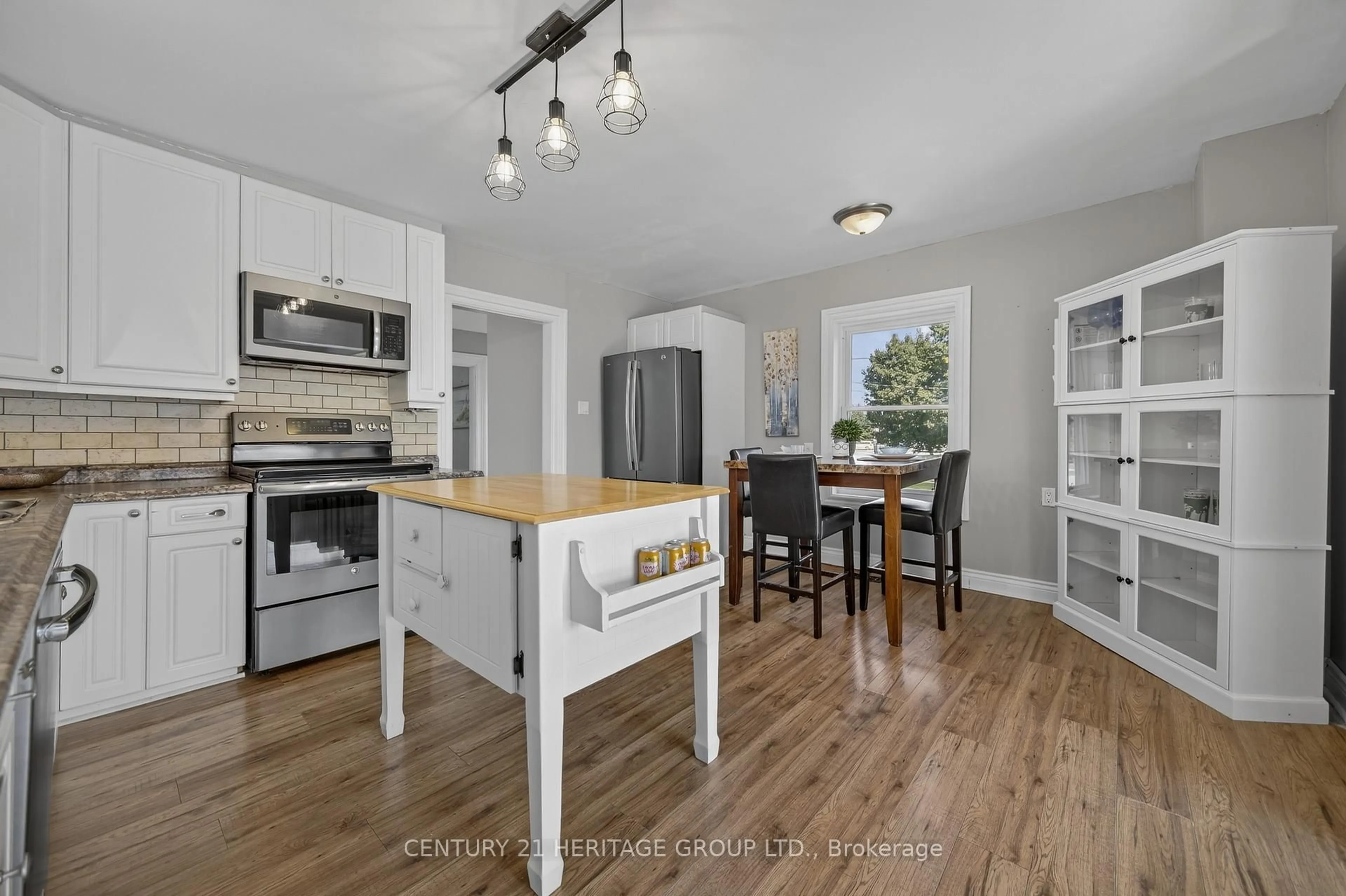 Open concept kitchen, wood/laminate floor for 397 Mara Rd, Brock Ontario L0K 1A0