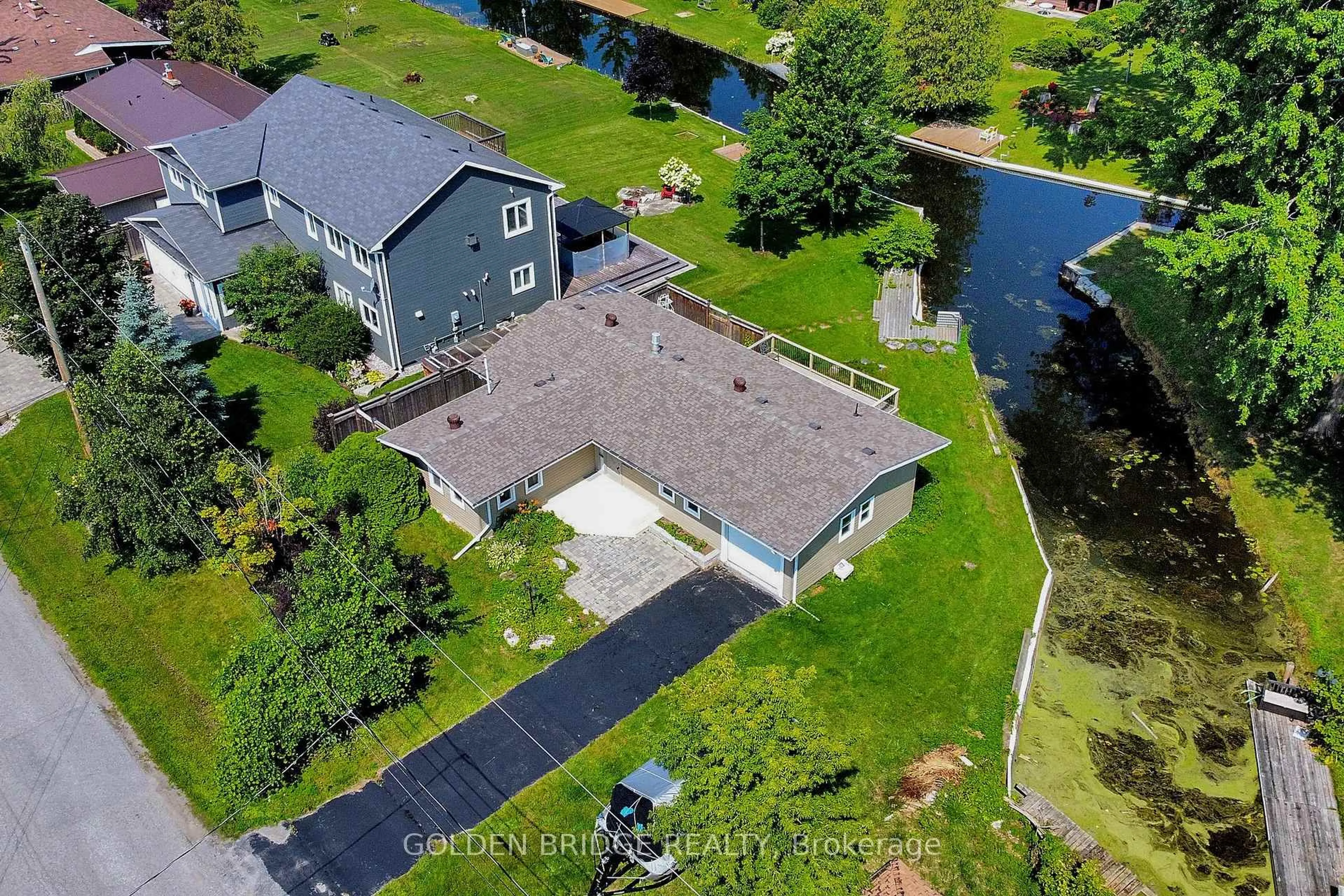 A pic from outside/outdoor area/front of a property/back of a property/a pic from drone, water/lake/river/ocean view for 196 South Channel Dr, Georgina Ontario L4P 2N3
