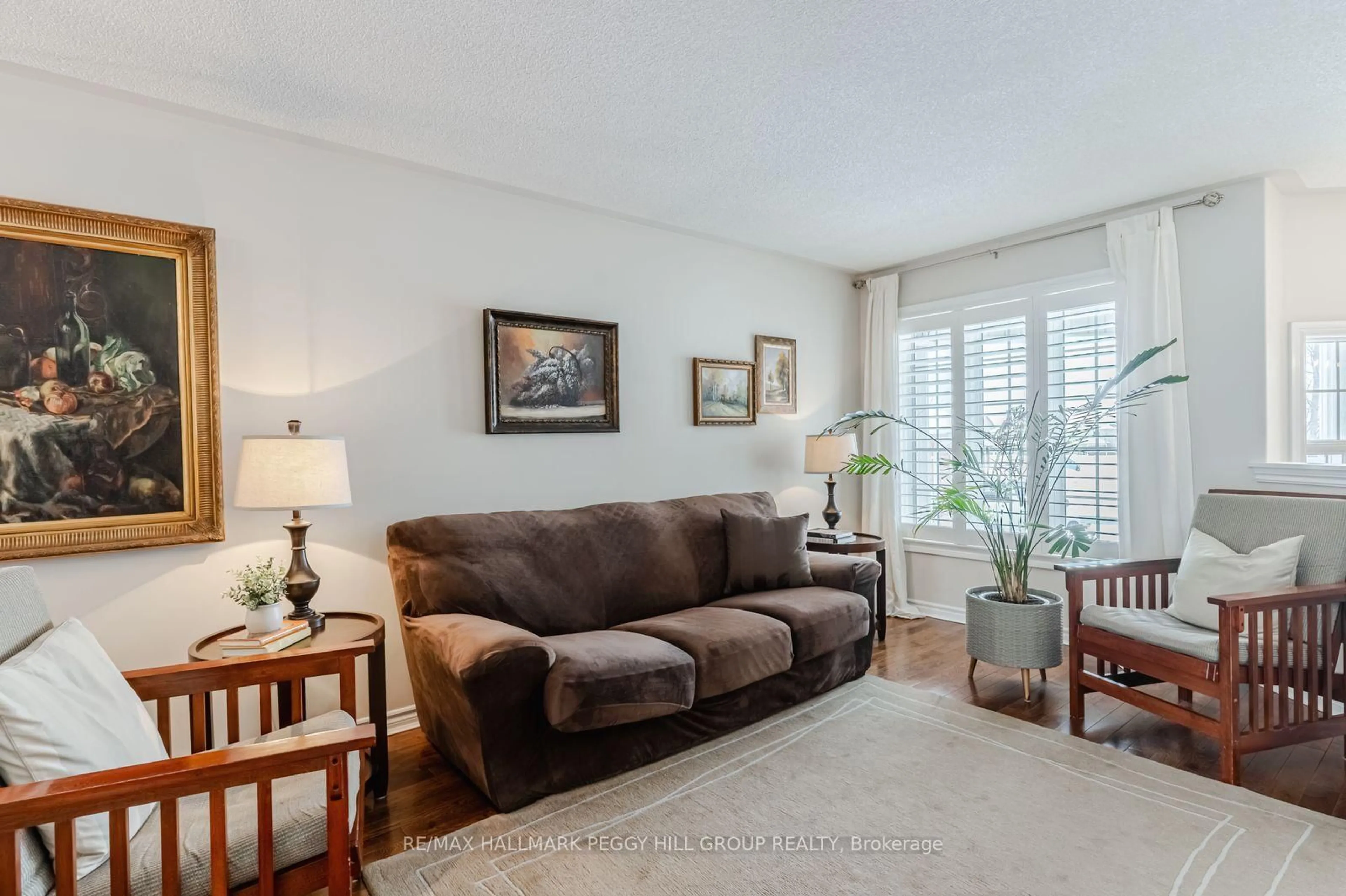 Living room with furniture, unknown for 39 Mike Hart Dr, Essa Ontario L3W 0P6