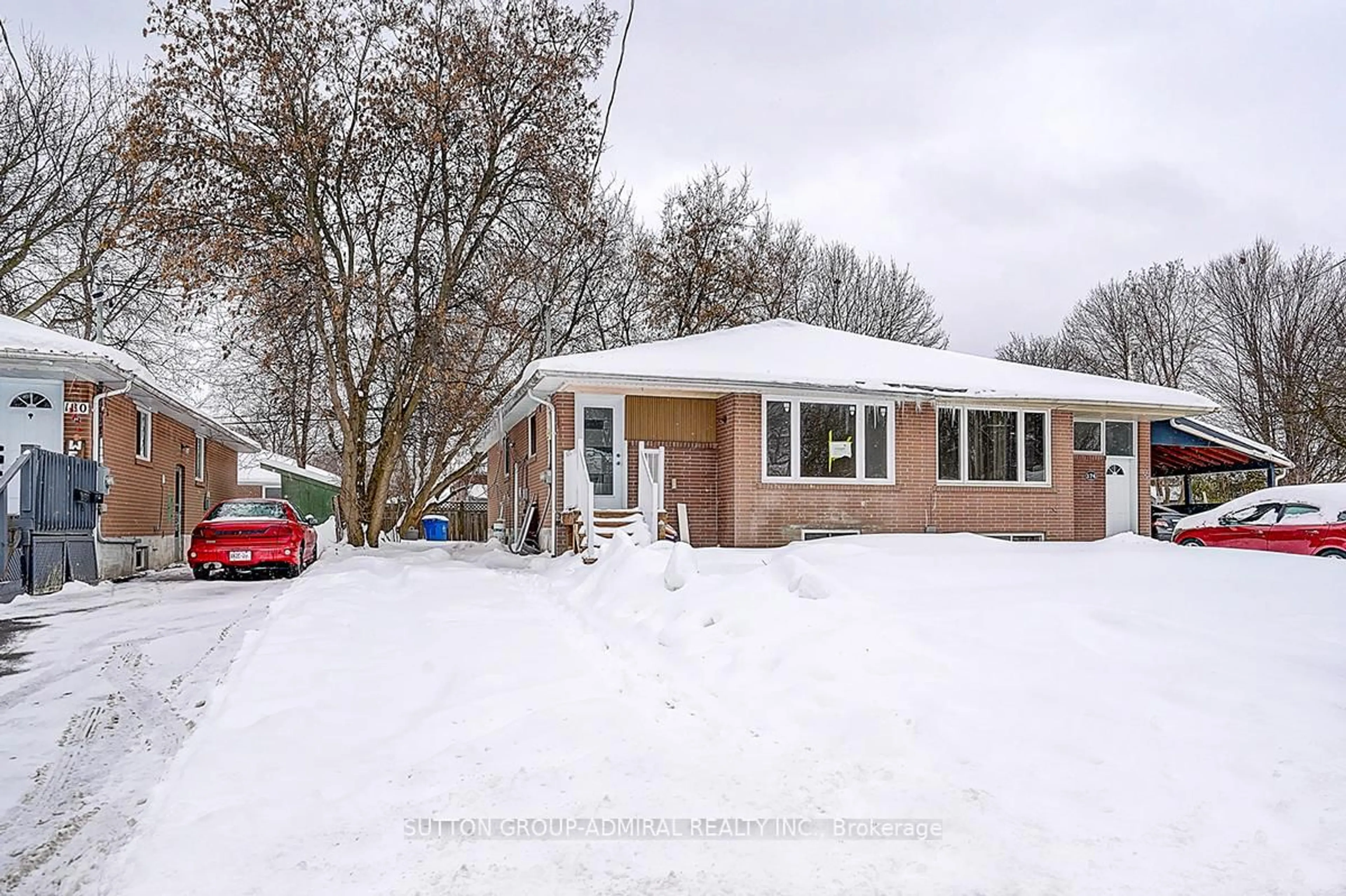 Home with brick exterior material, street for 176 Cherrywood Dr, Newmarket Ontario L3Y 2X8