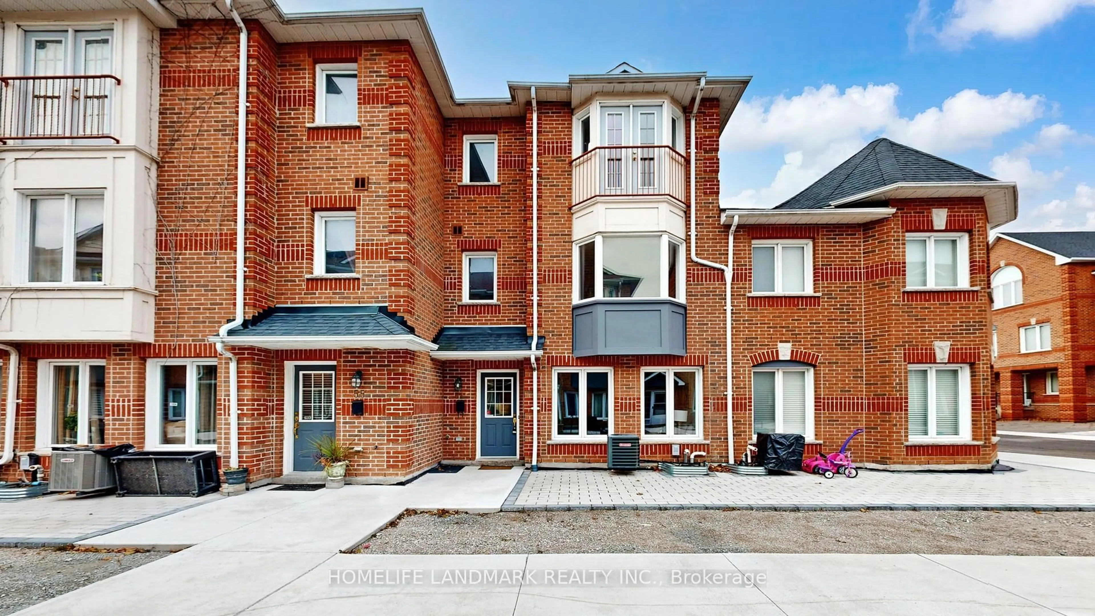 Home with brick exterior material, building for 151 Townsgate Dr #54, Vaughan Ontario L4J 8J7