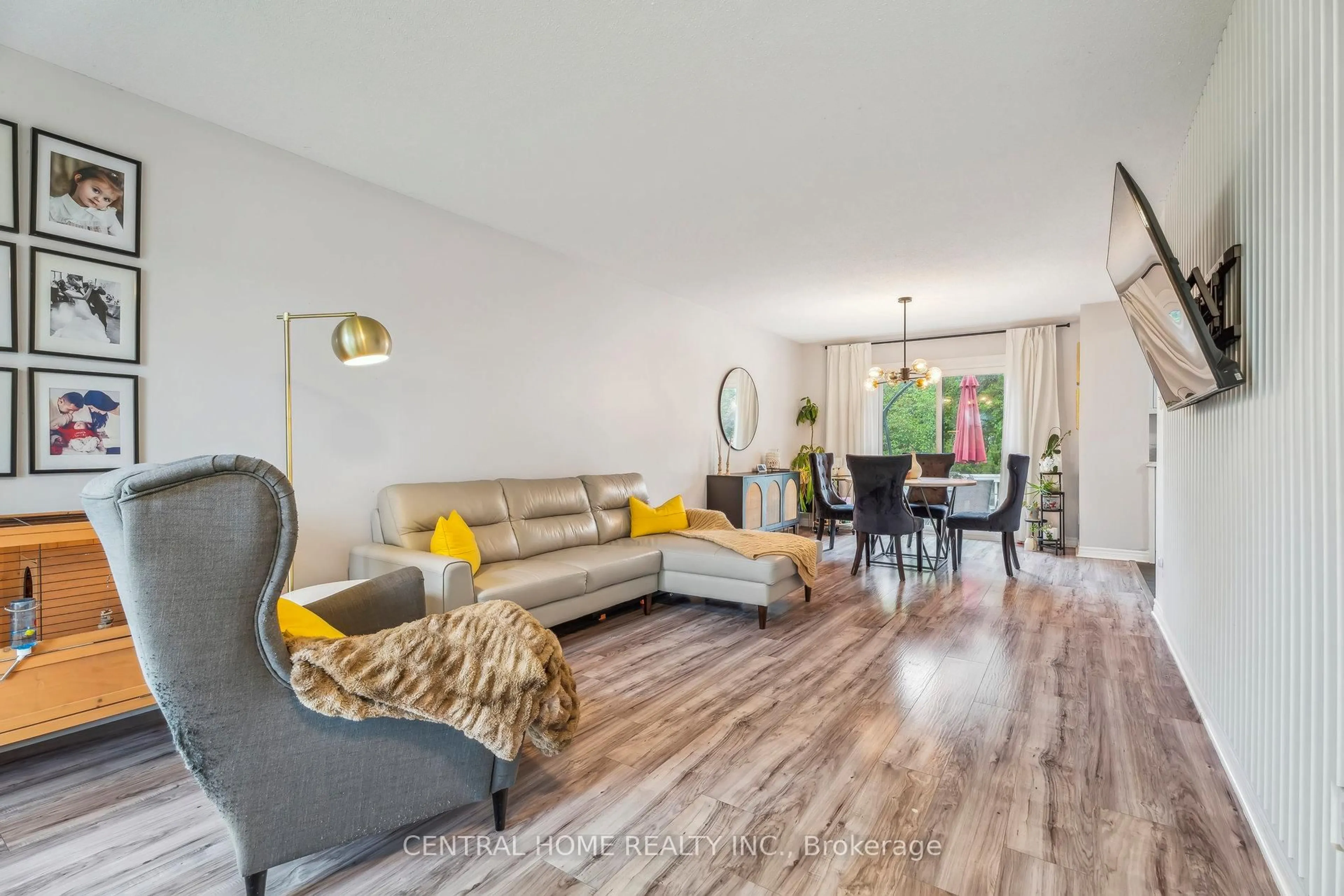 Living room with furniture, wood/laminate floor for 50 Metro Rd, Georgina Ontario L4P 3K8