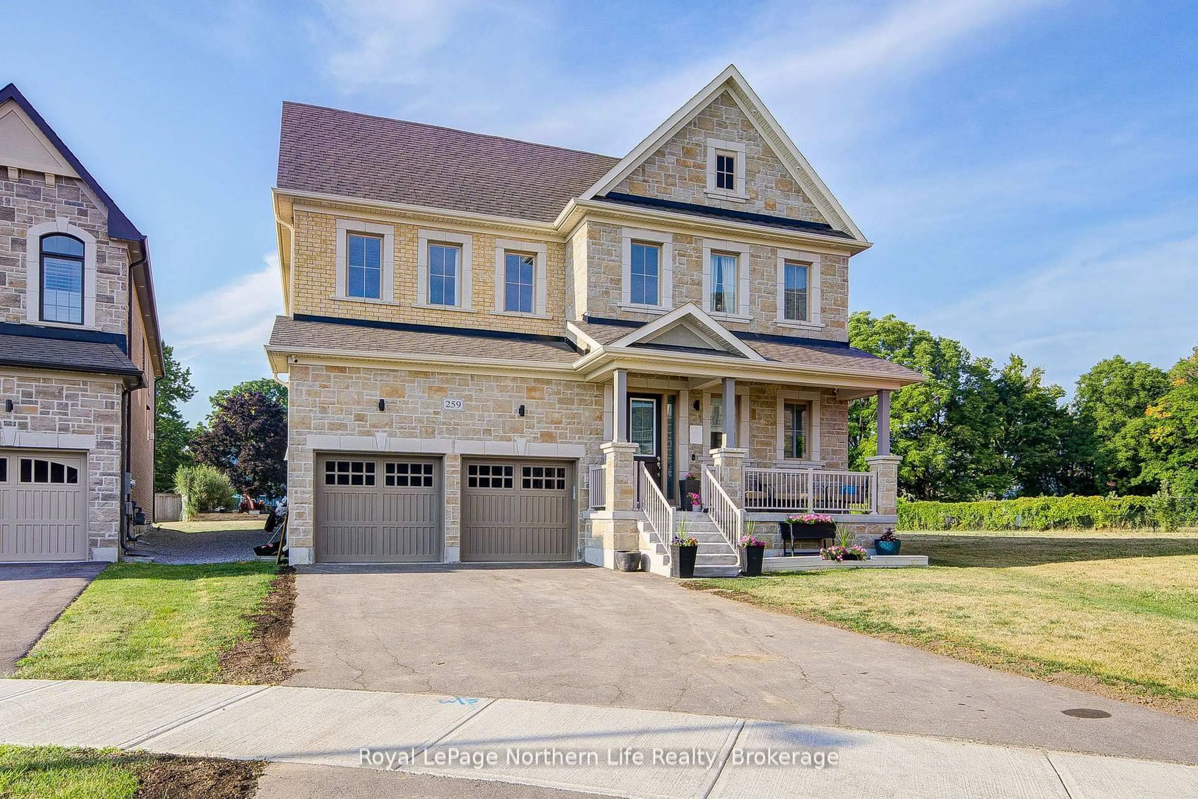 Home with brick exterior material, street for 259 Danny Wheeler Blvd, Georgina Ontario L4P 0J9