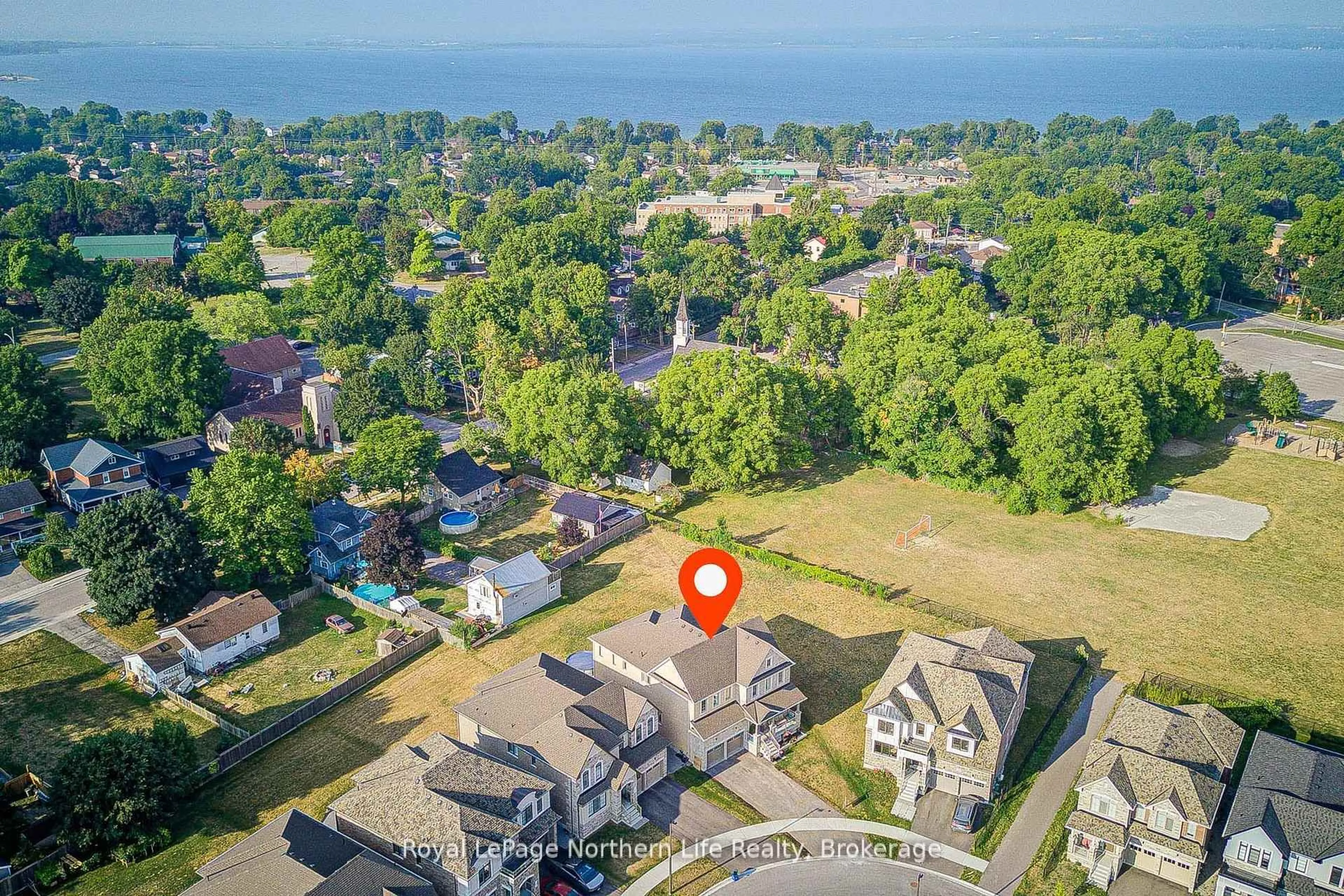 A pic from outside/outdoor area/front of a property/back of a property/a pic from drone, water/lake/river/ocean view for 259 Danny Wheeler Blvd, Georgina Ontario L4P 0J9