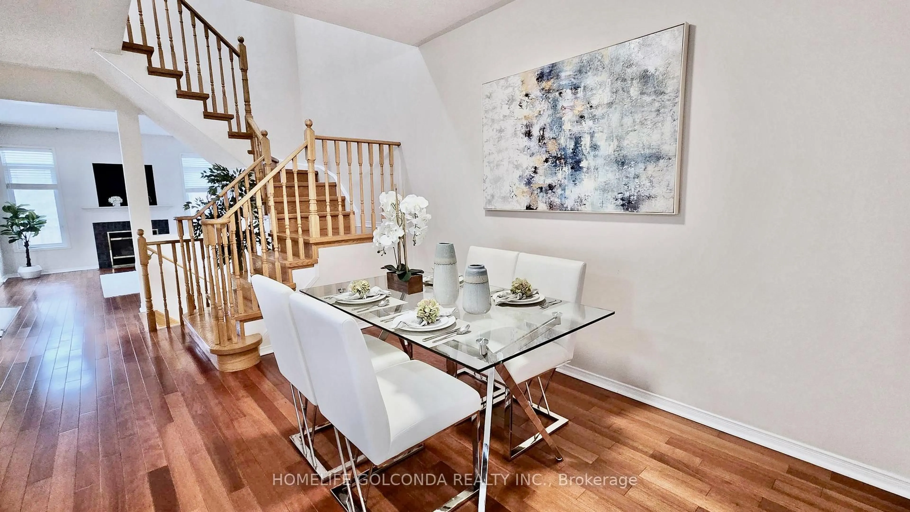 Dining room, wood/laminate floor for 73 Snowdon Circ, Markham Ontario L3P 7S5