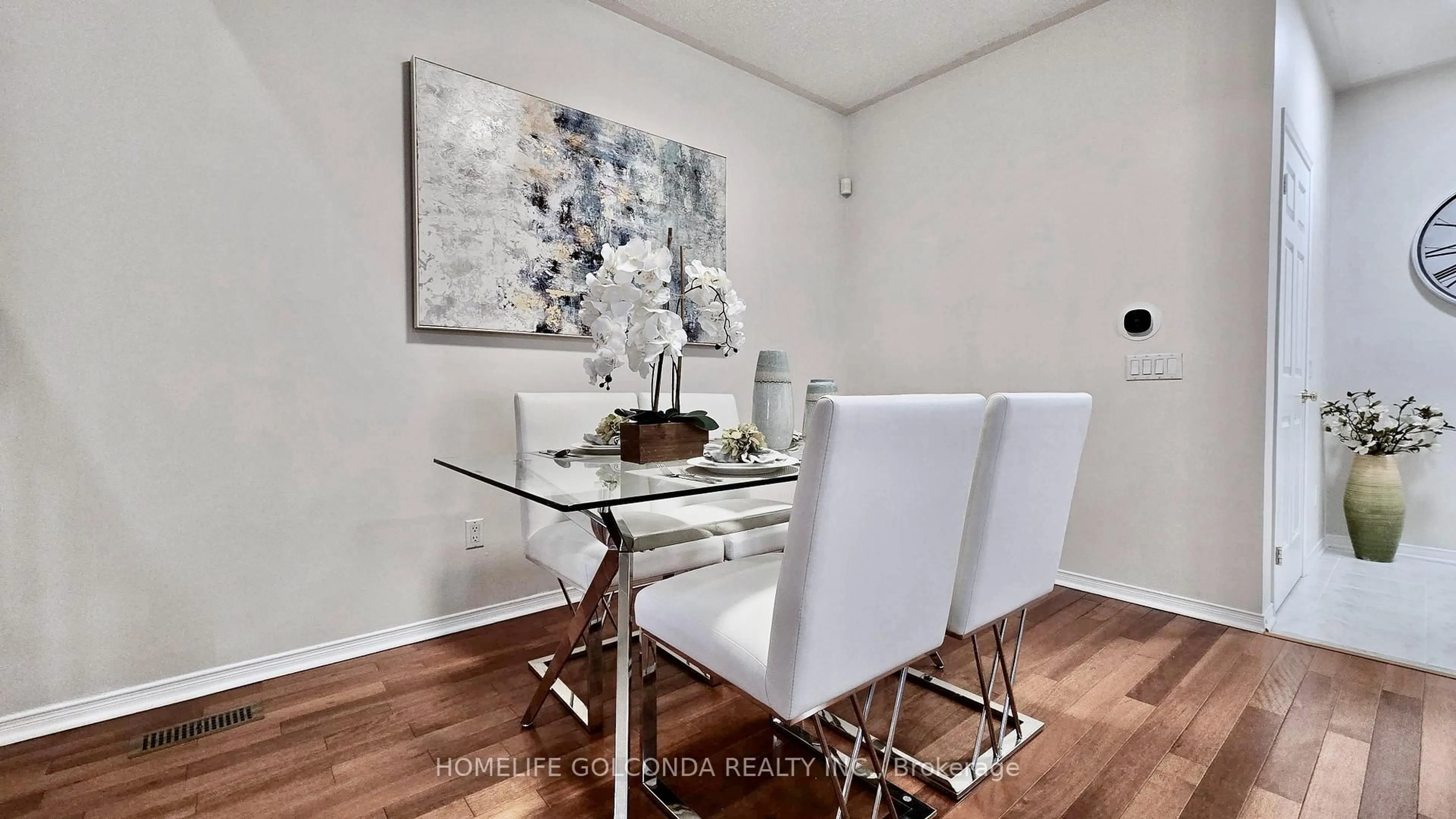 Dining room, wood/laminate floor for 73 Snowdon Circ, Markham Ontario L3P 7S5