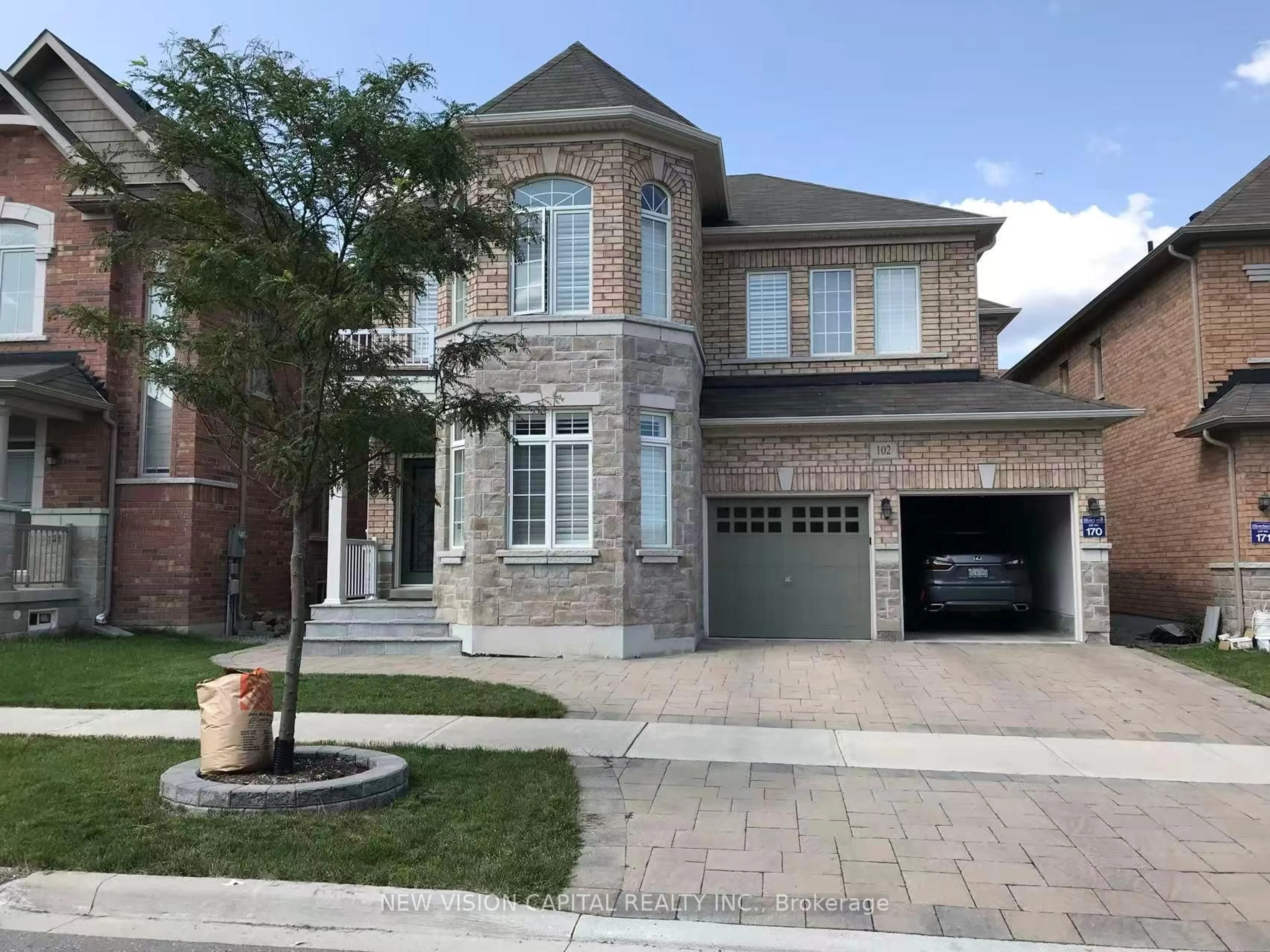 Home with brick exterior material, street for 102 Hua Du Ave, Markham Ontario L6C 0R2