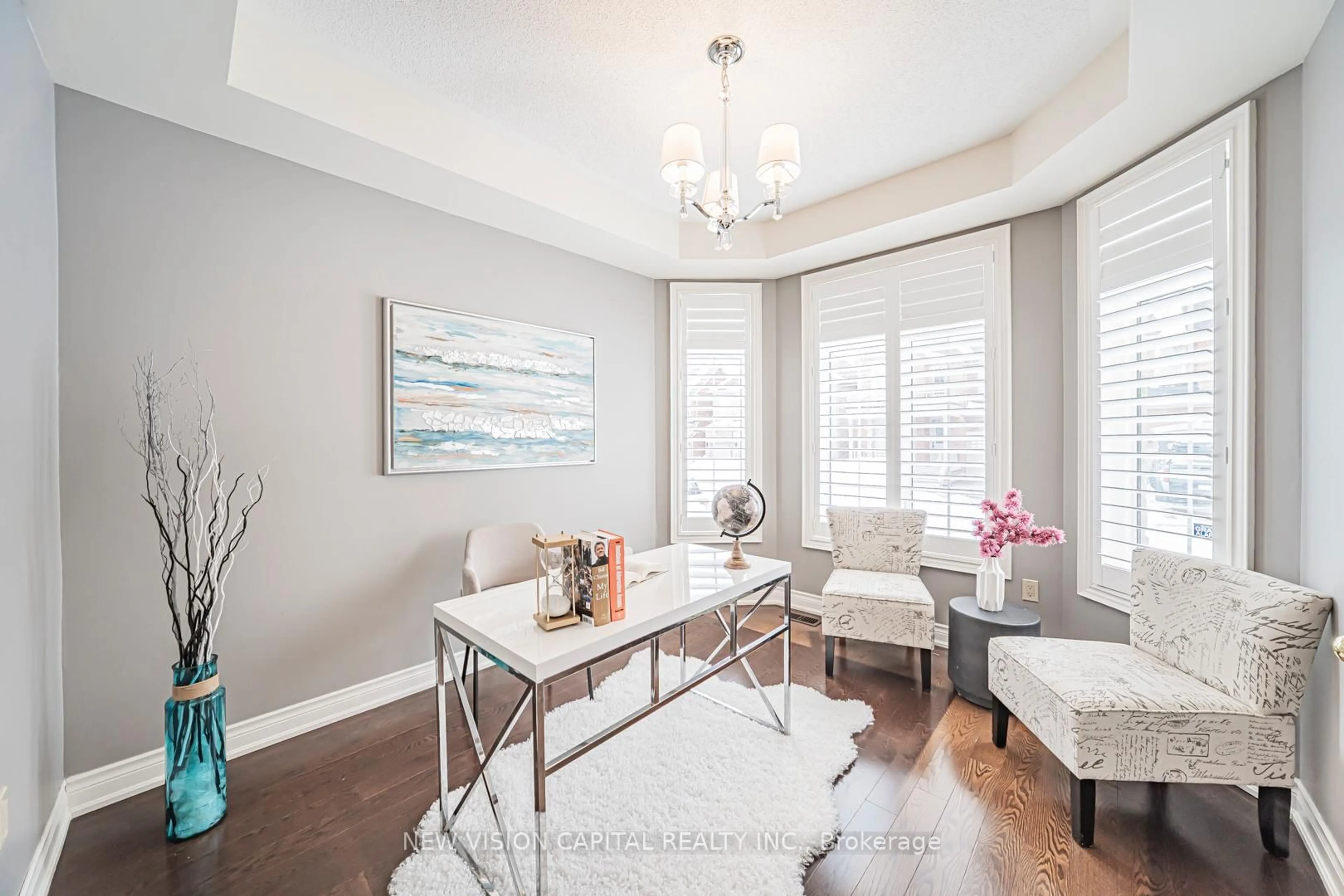 Living room with furniture, wood/laminate floor for 102 Hua Du Ave, Markham Ontario L6C 0R2