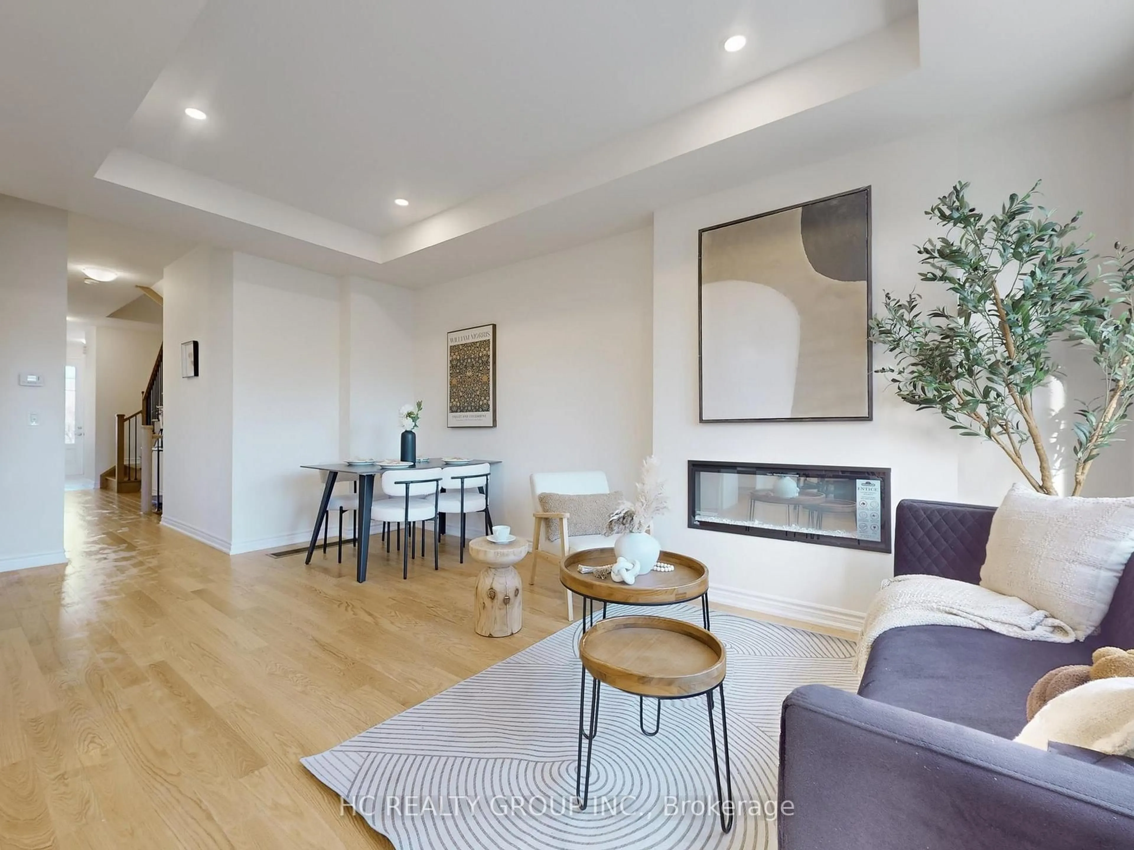 Living room with furniture, wood/laminate floor for 66 Main St #7, King Ontario L0G 1T0