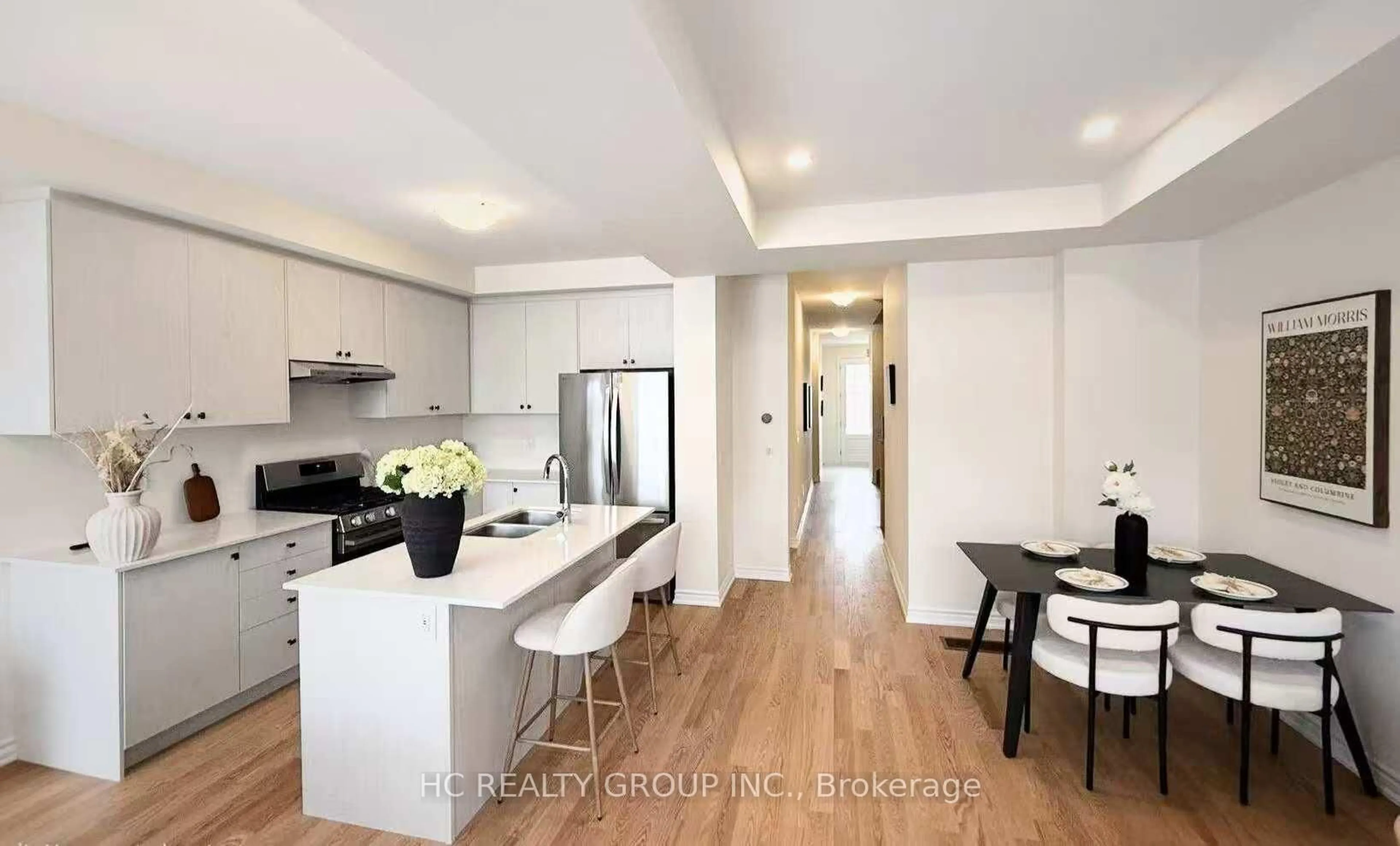 Open concept kitchen, wood/laminate floor for 66 Main St #7, King Ontario L0G 1T0