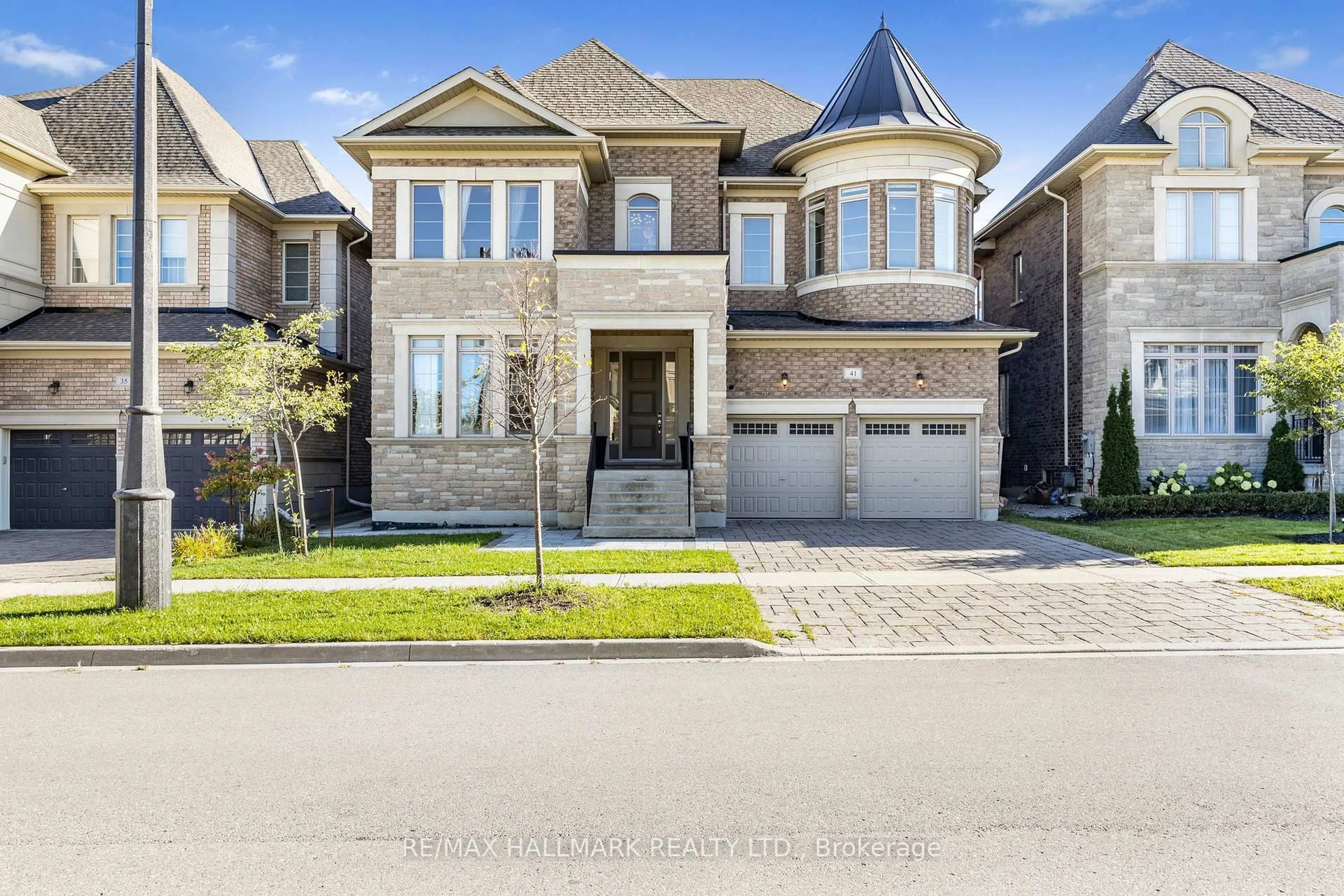 Home with brick exterior material, street for 41 Glen Abbey Tr, Vaughan Ontario L4H 3X7