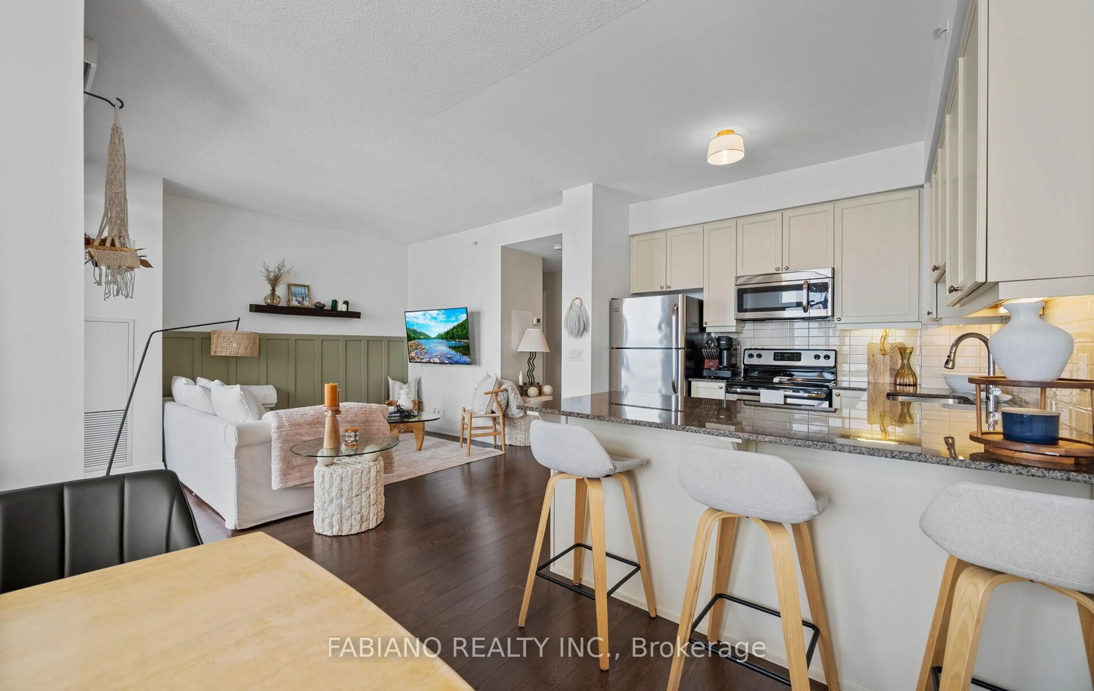 Open concept kitchen, wood/laminate floor for 24 Woodstream Blvd #815, Vaughan Ontario L4L 8C4