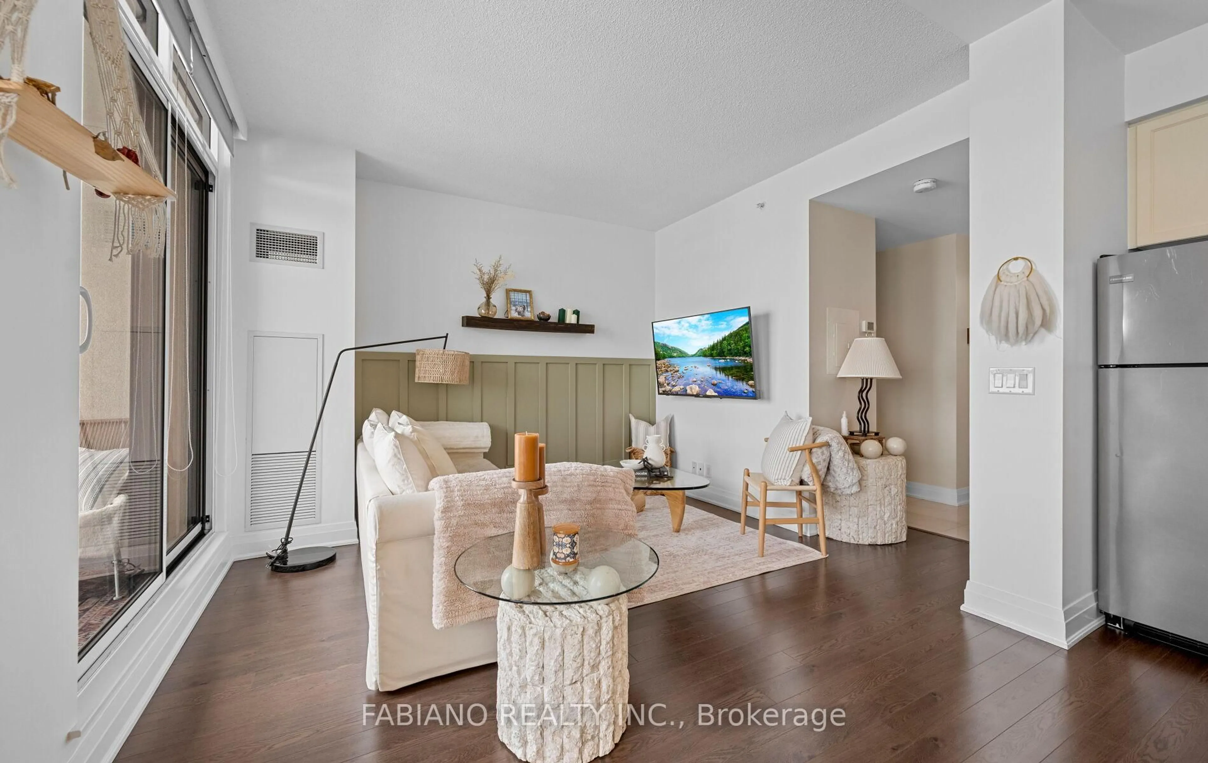Living room with furniture, wood/laminate floor for 24 Woodstream Blvd #815, Vaughan Ontario L4L 8C4
