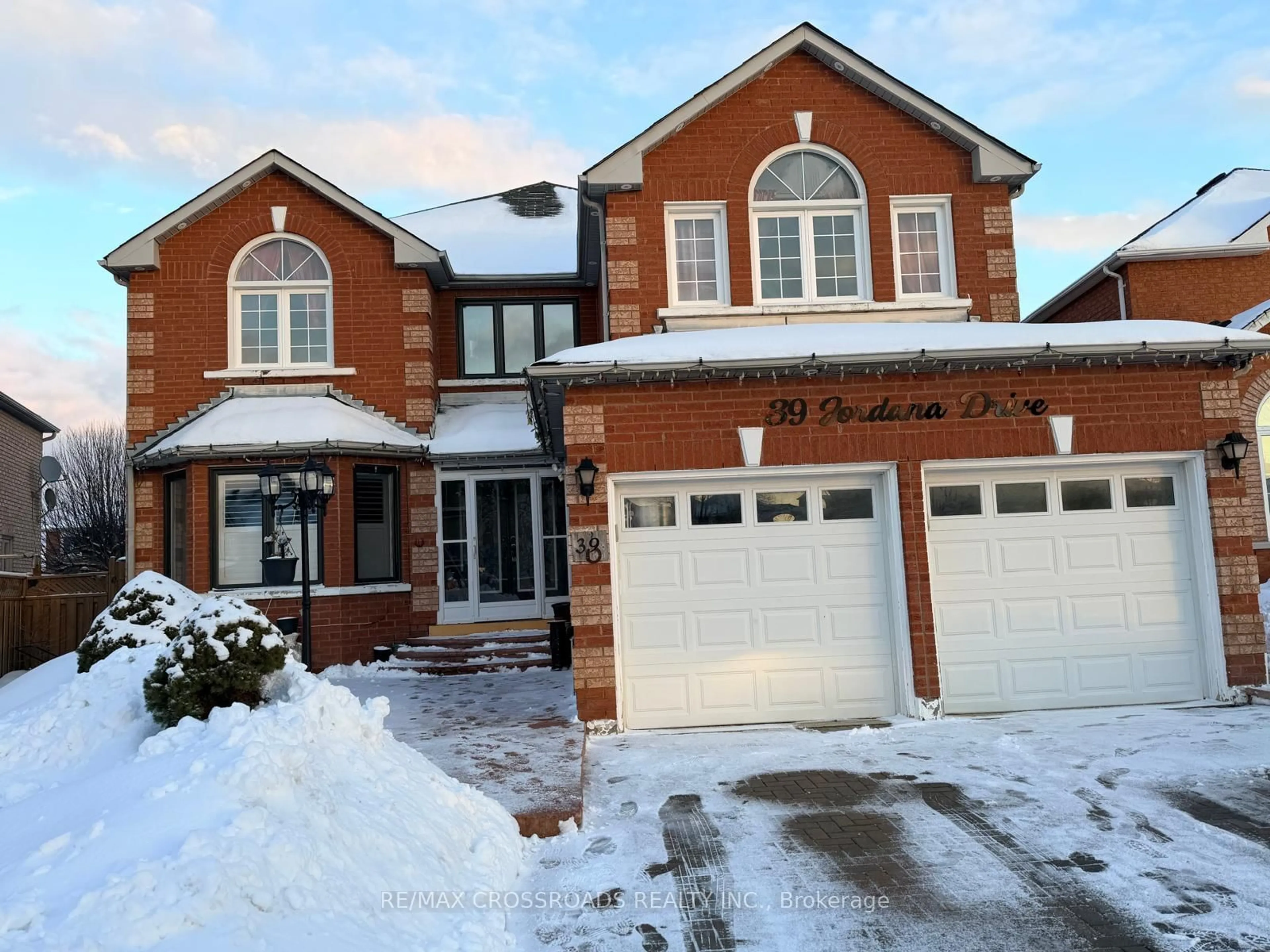 Home with brick exterior material, street for 39 Jordana Dr, Markham Ontario L3S 3N8