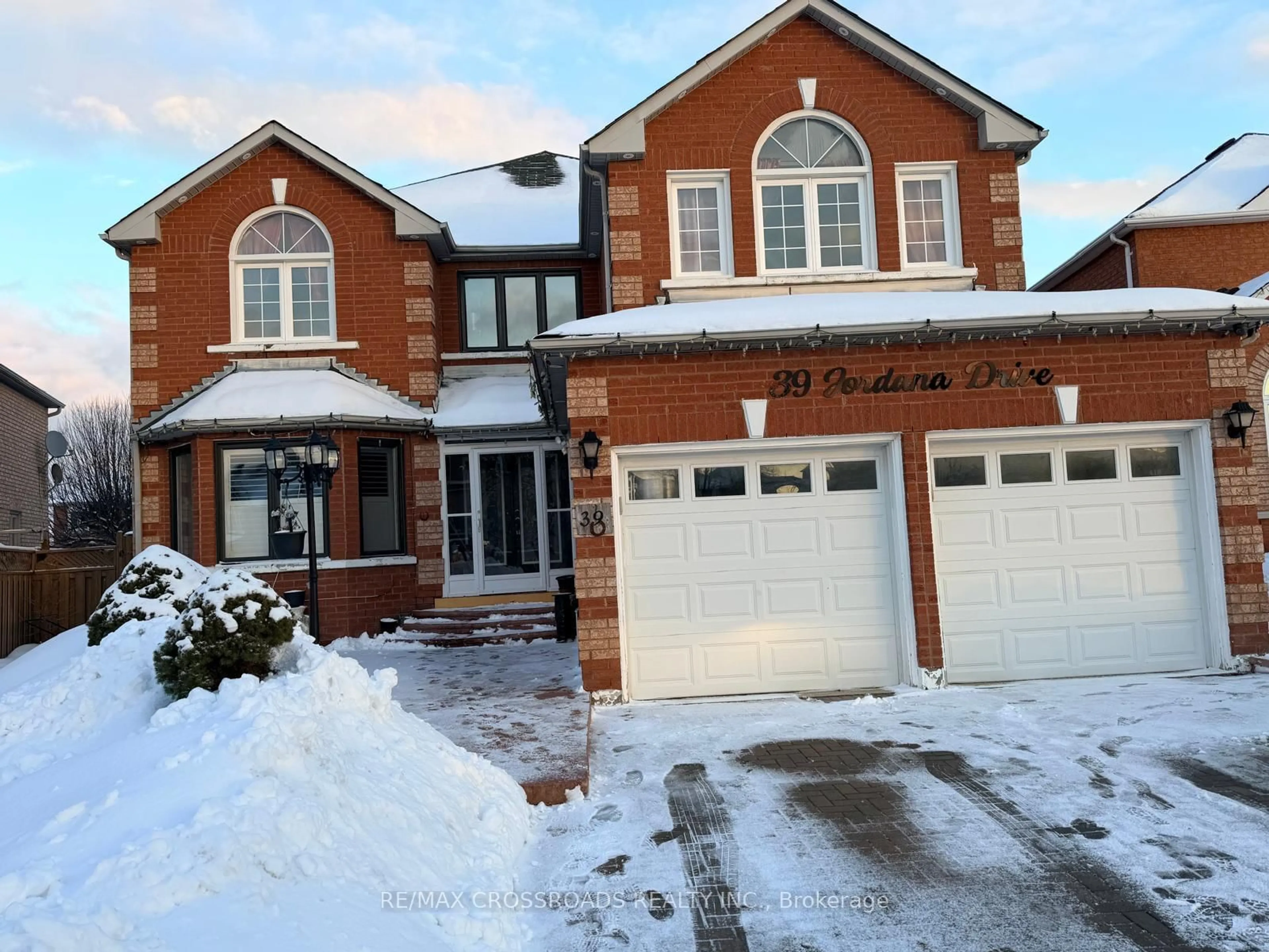 Home with brick exterior material, street for 39 Jordana Dr, Markham Ontario L3S 3N8
