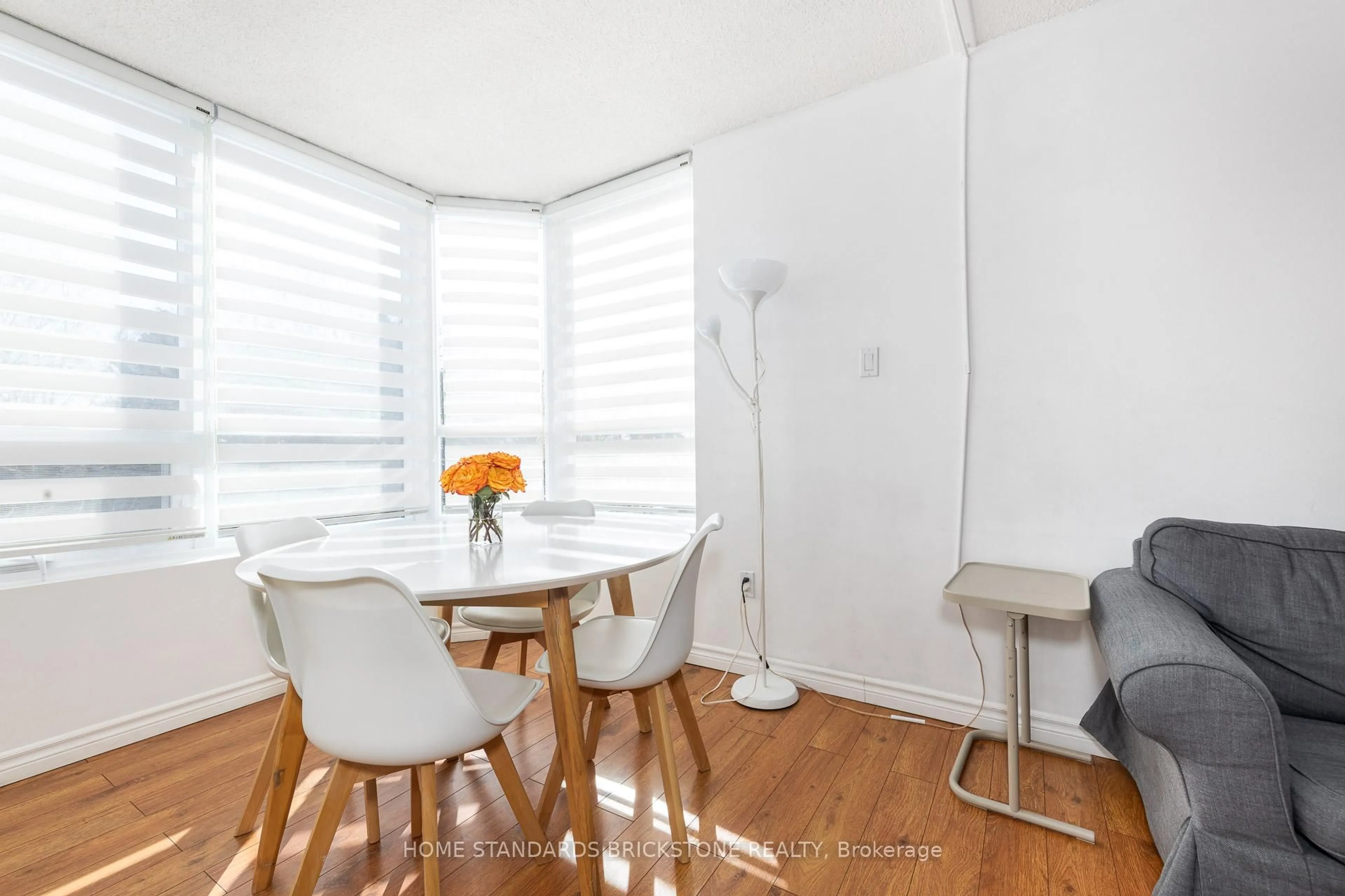 Dining room, wood/laminate floor for 7601 Bathurst St #205, Vaughan Ontario L4J 4H5