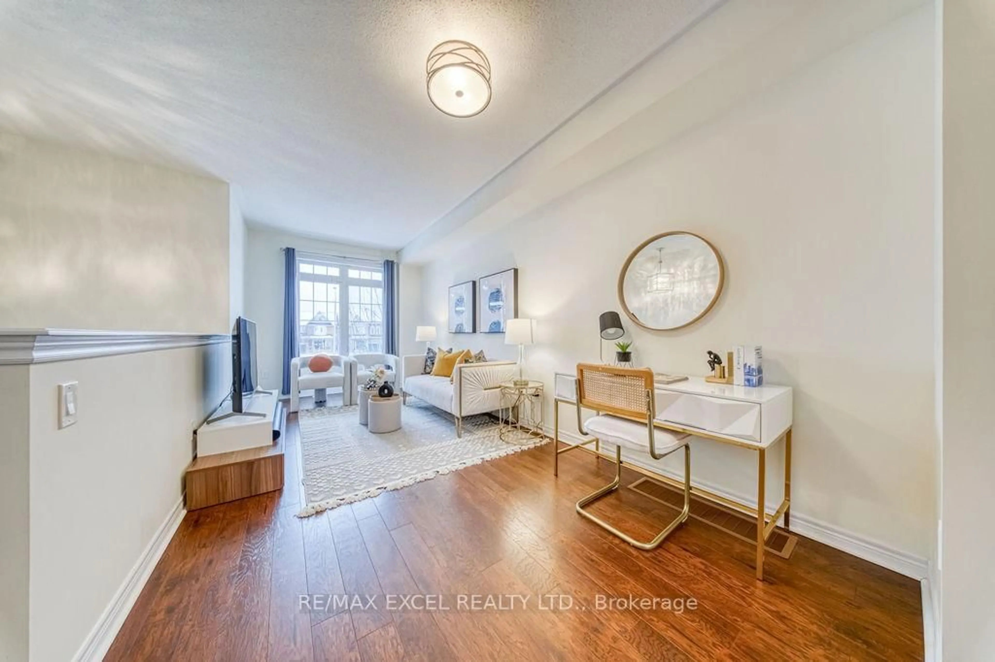 Living room with furniture, unknown for 187 Dundas Way, Markham Ontario L6E 0T1