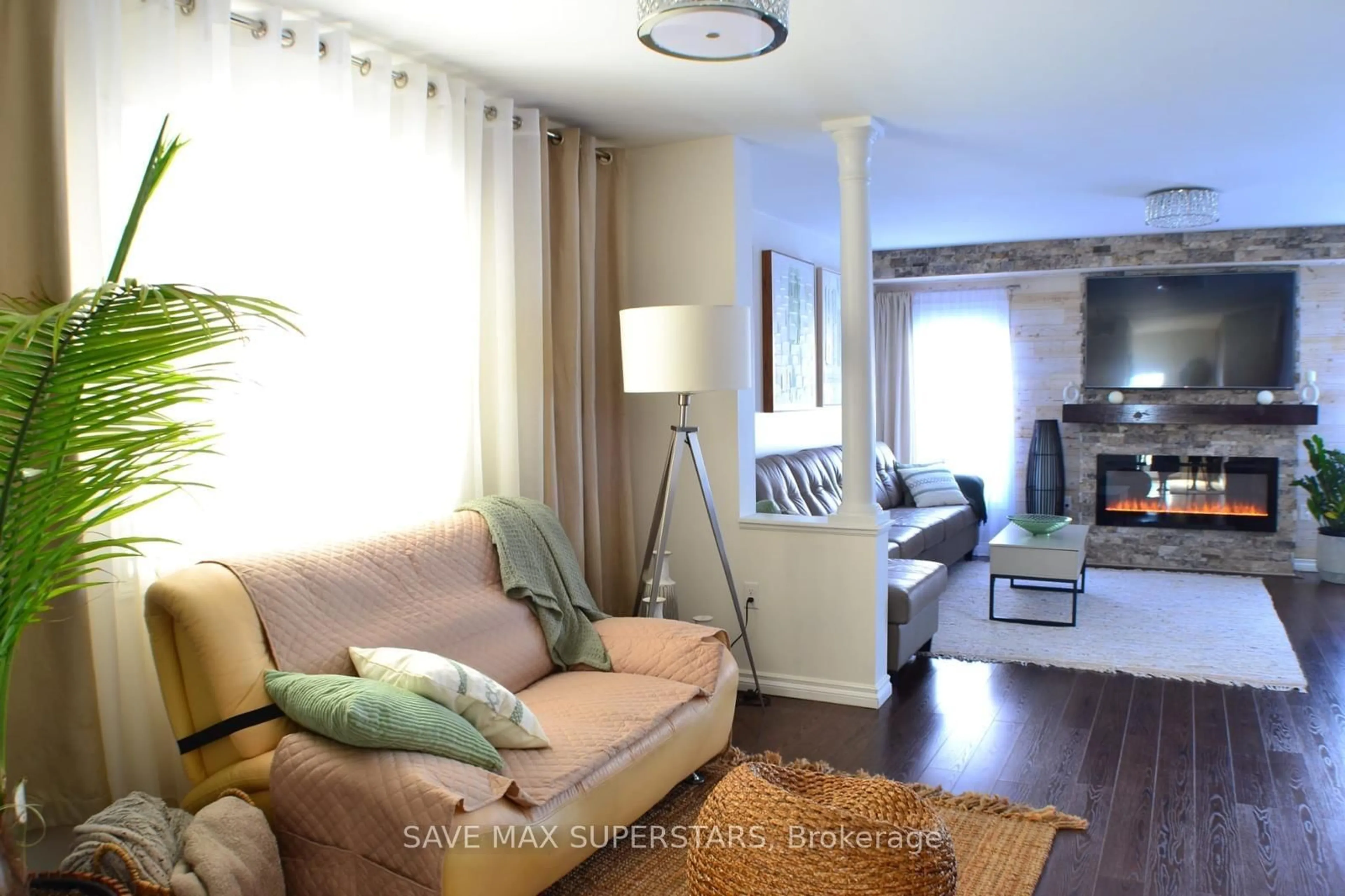 Living room with furniture, wood/laminate floor for 1246 LESLIE Dr, Innisfil Ontario L9S 0G3