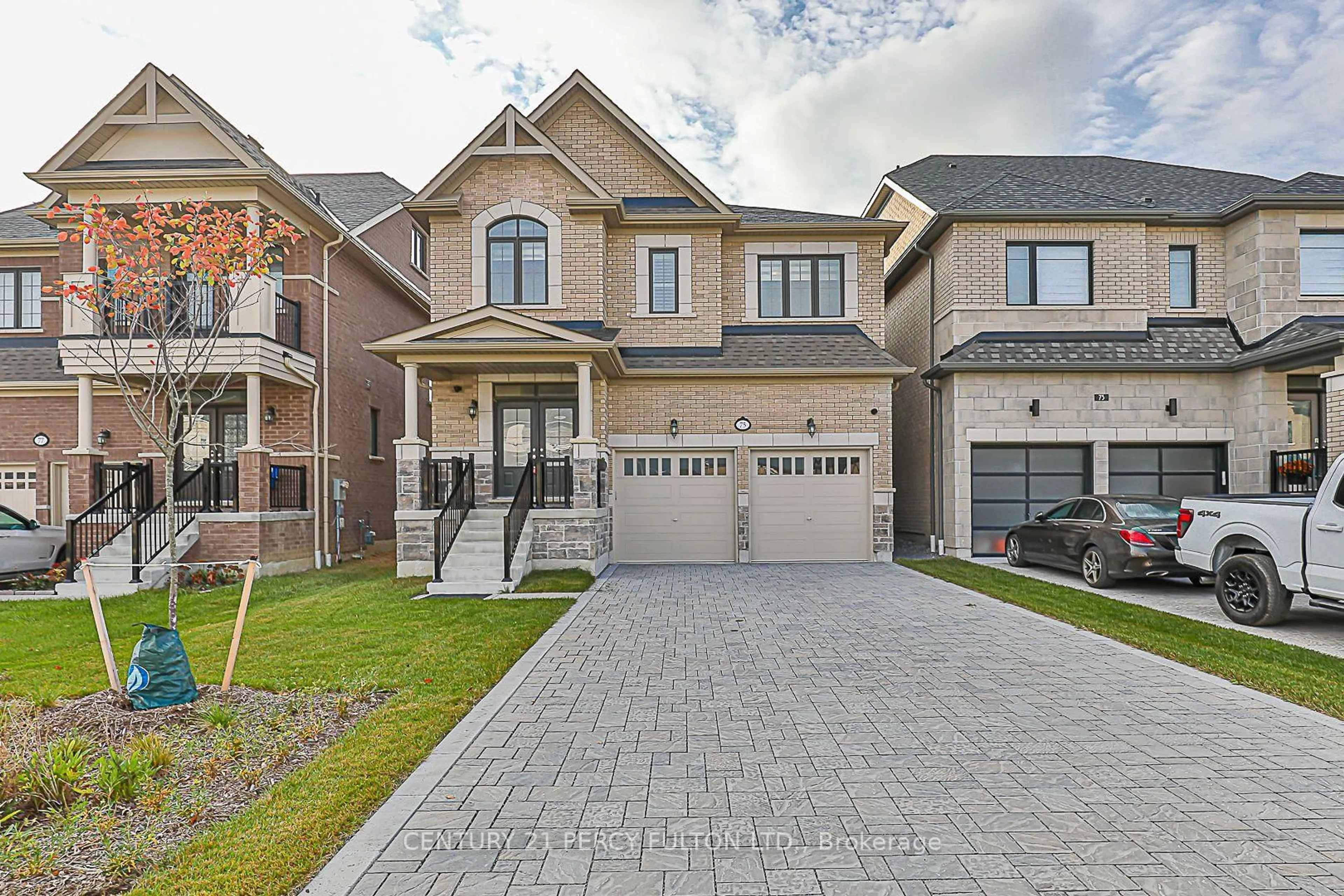 Home with brick exterior material, street for 75 Jinnah Ave, Markham Ontario L3S 0G3