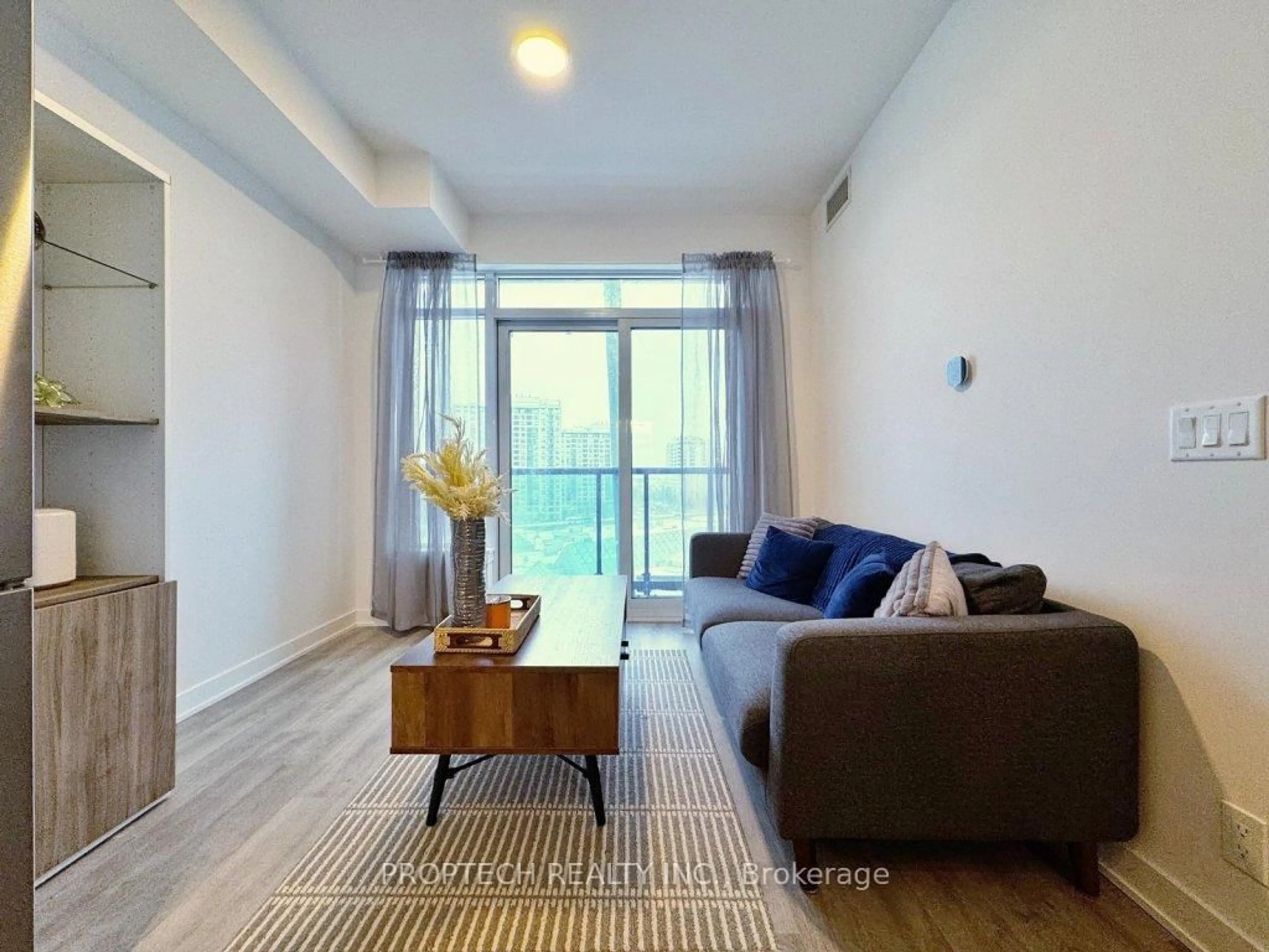 Living room with furniture, unknown for 50 Upper Mall Way #628, Vaughan Ontario L4J 0L8