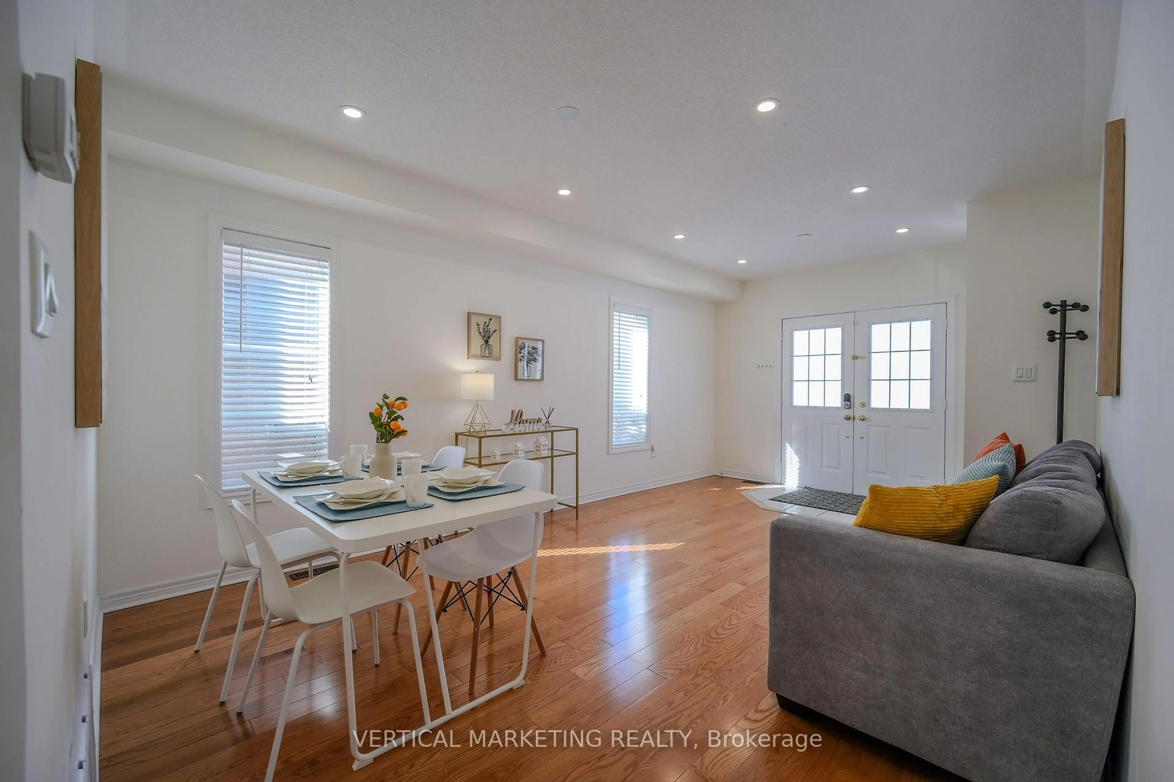 Living room with furniture, wood/laminate floor for 37 Mynden Way, Newmarket Ontario L3X 3A7