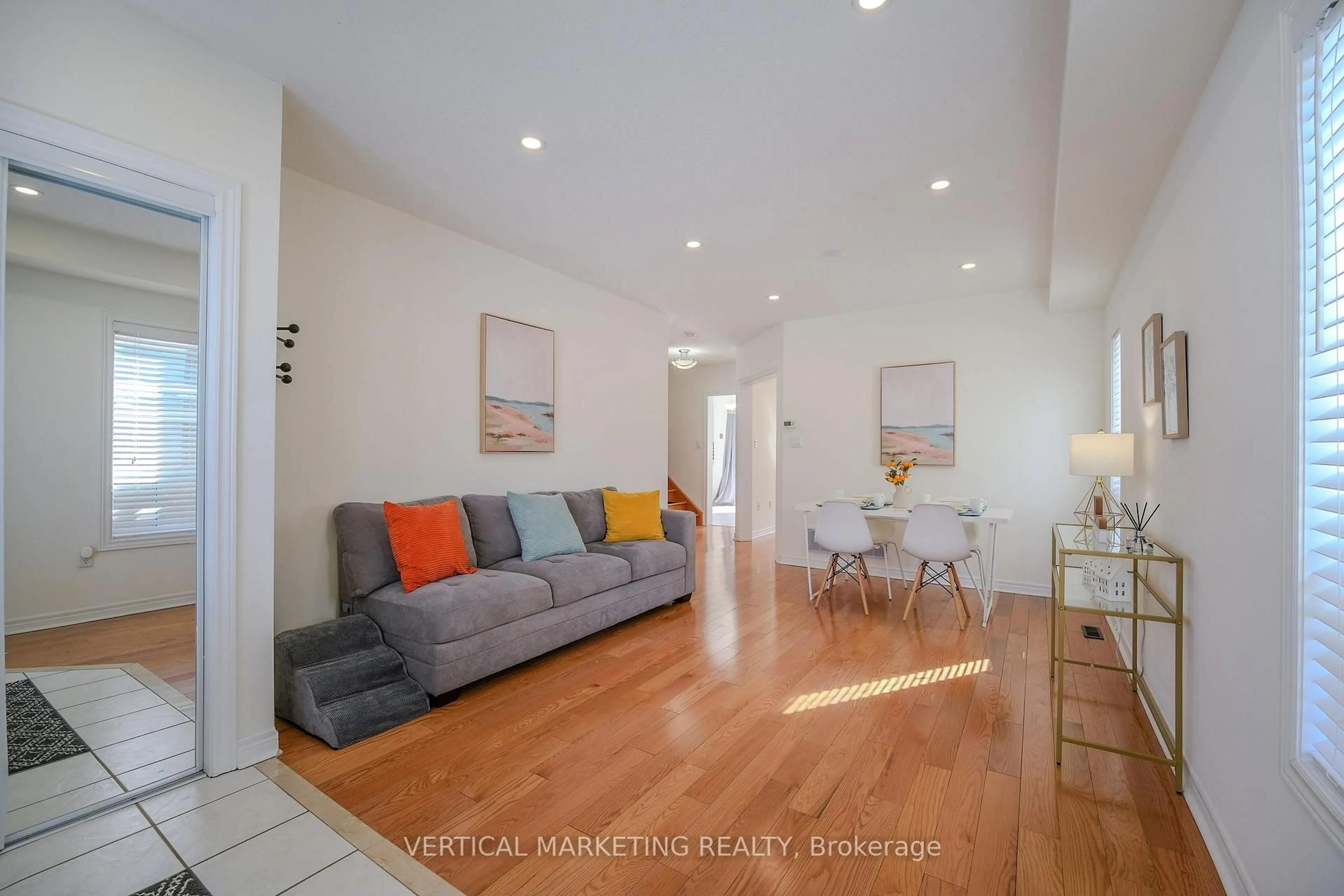 Living room with furniture, wood/laminate floor for 37 Mynden Way, Newmarket Ontario L3X 3A7