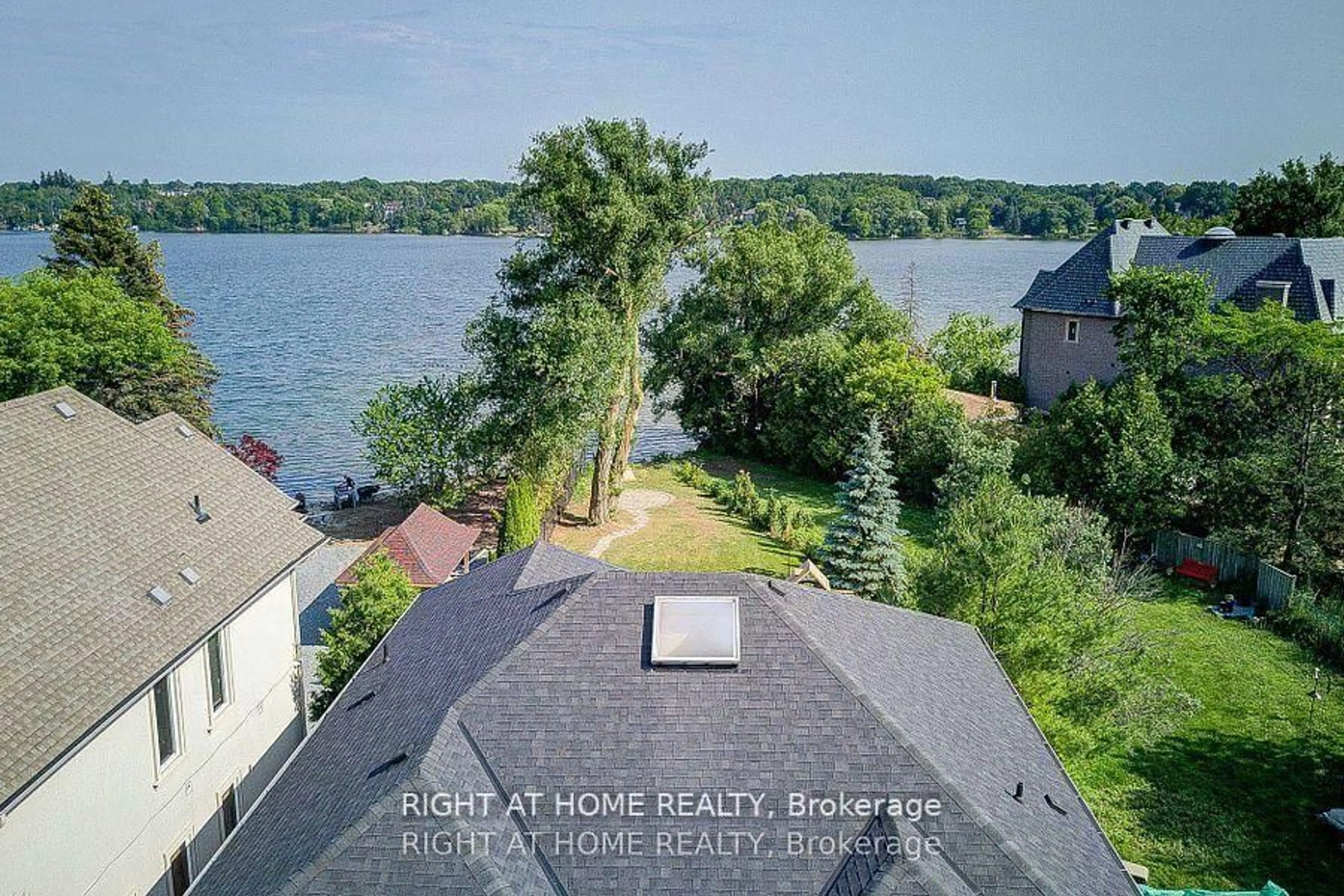 A pic from outside/outdoor area/front of a property/back of a property/a pic from drone, water/lake/river/ocean view for 429 North Lake Rd, Richmond Hill Ontario L4E 3A7