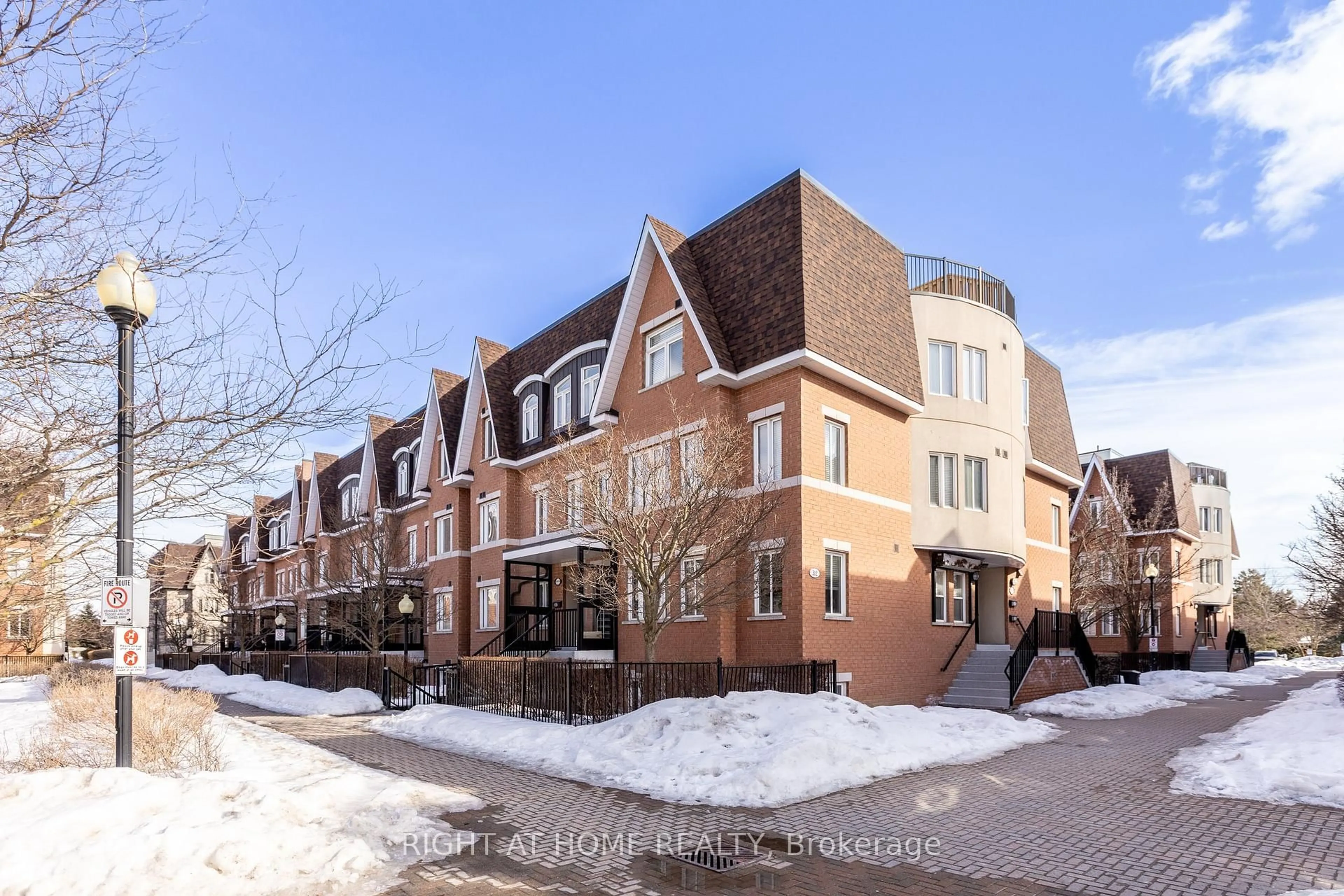 Home with brick exterior material, street for 312 John St #331, Markham Ontario L3T 0A7