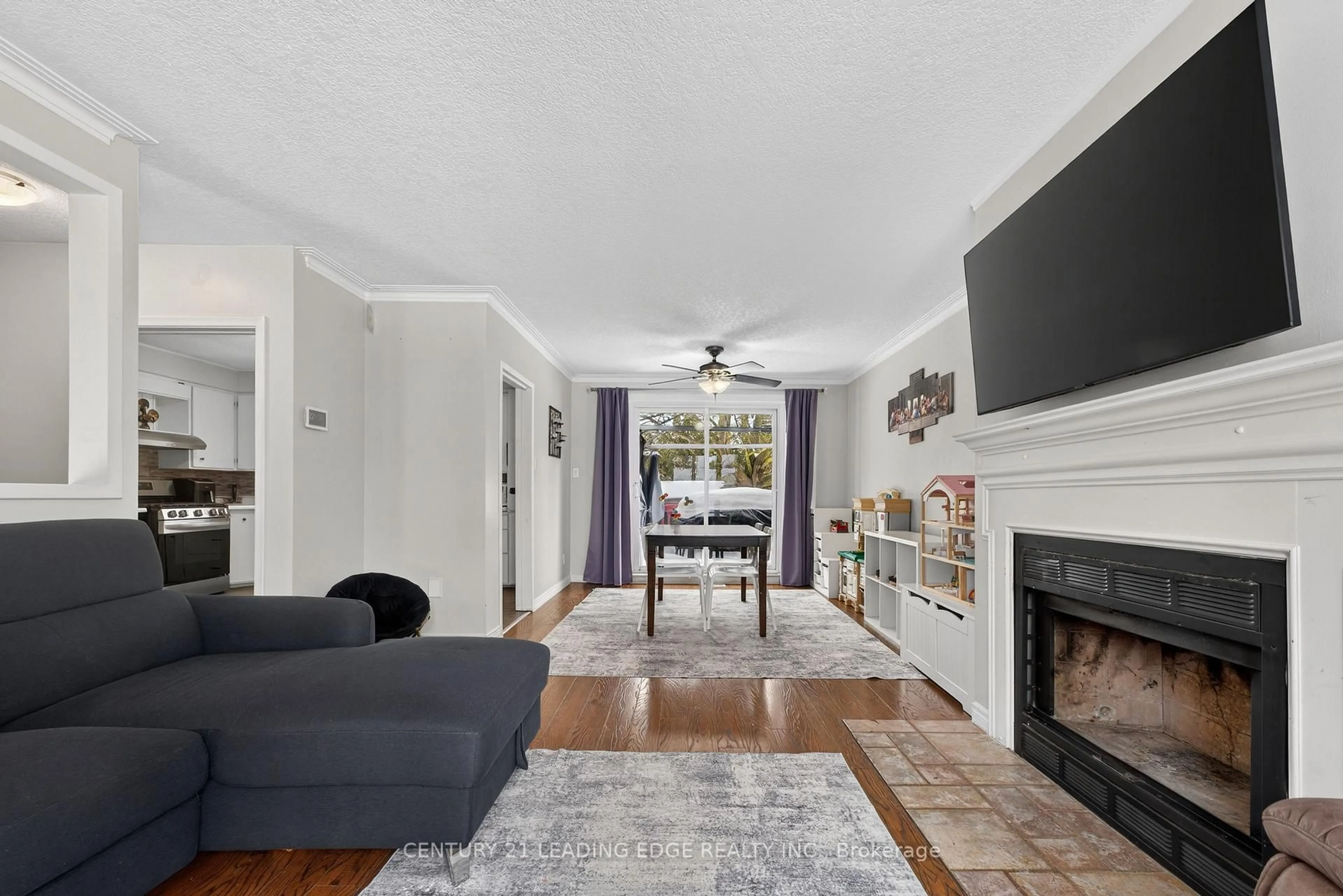 Living room with furniture, unknown for 8 Doner St, New Tecumseth Ontario L9R 1M5