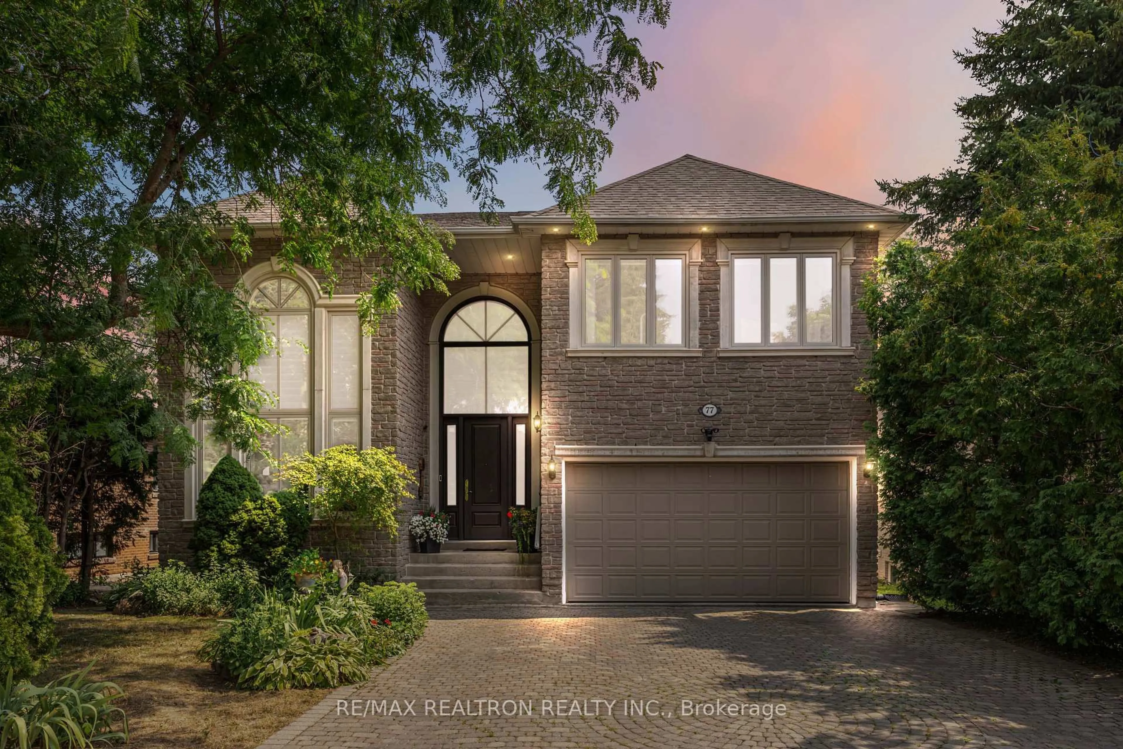 Home with brick exterior material, street for 77 Sprucewood Dr, Markham Ontario L3T 2P9