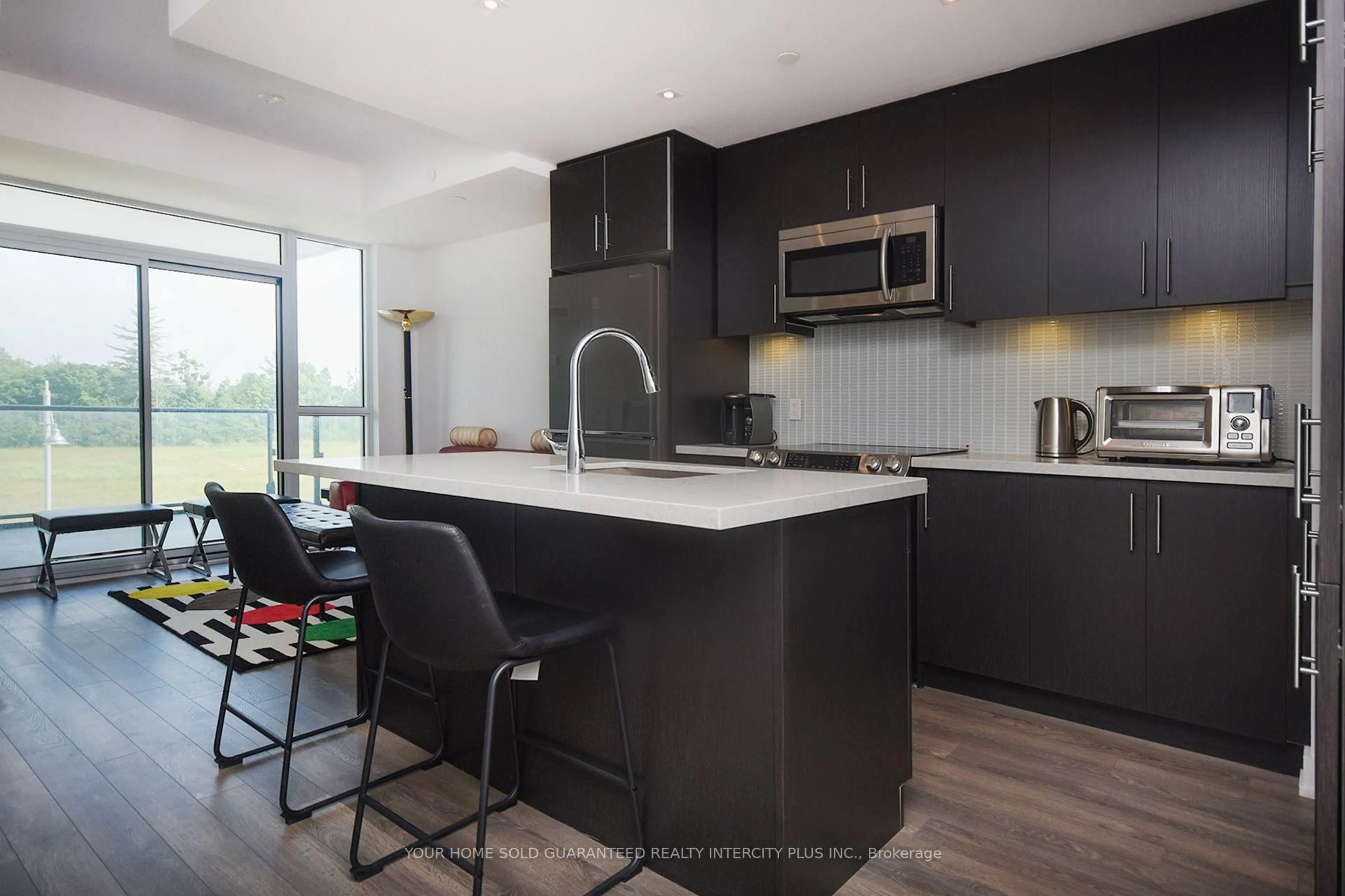 Open concept kitchen, unknown for 375 Sea Ray Ave #309, Innisfil Ontario L9S 0N9