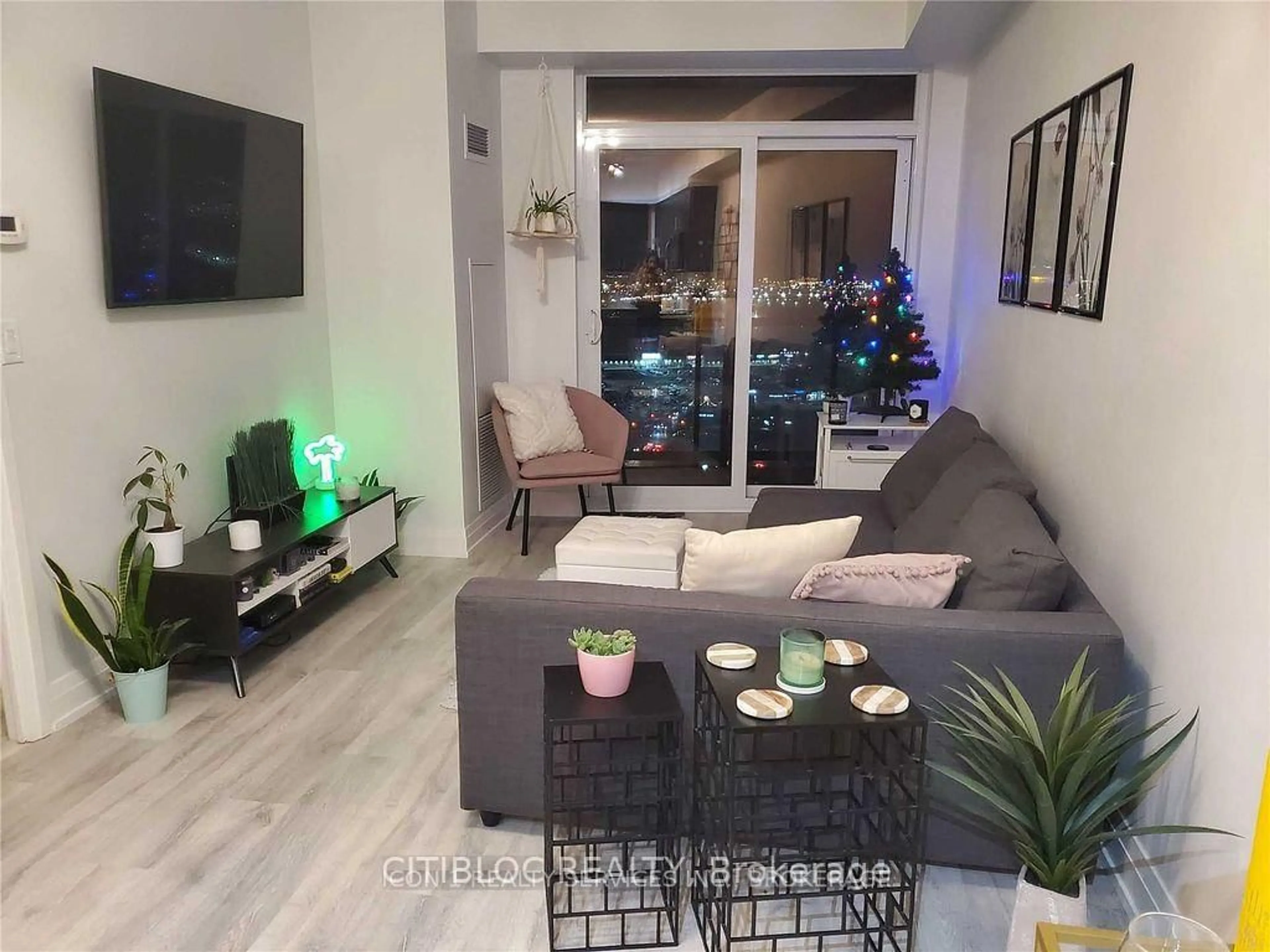 Living room with furniture, wood/laminate floor for 3600 Highway 7 Rd #2309, Vaughan Ontario L4L 0G7