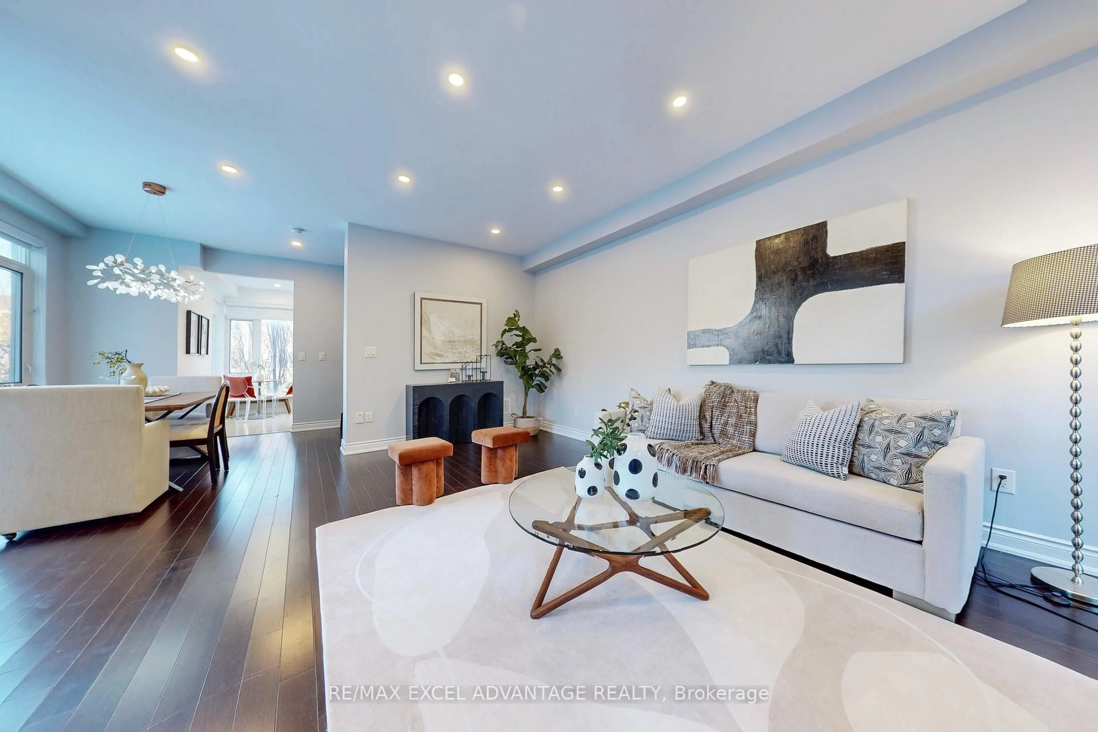 Living room with furniture, wood/laminate floor for 301 South Park Rd, Markham Ontario L3T 0B9