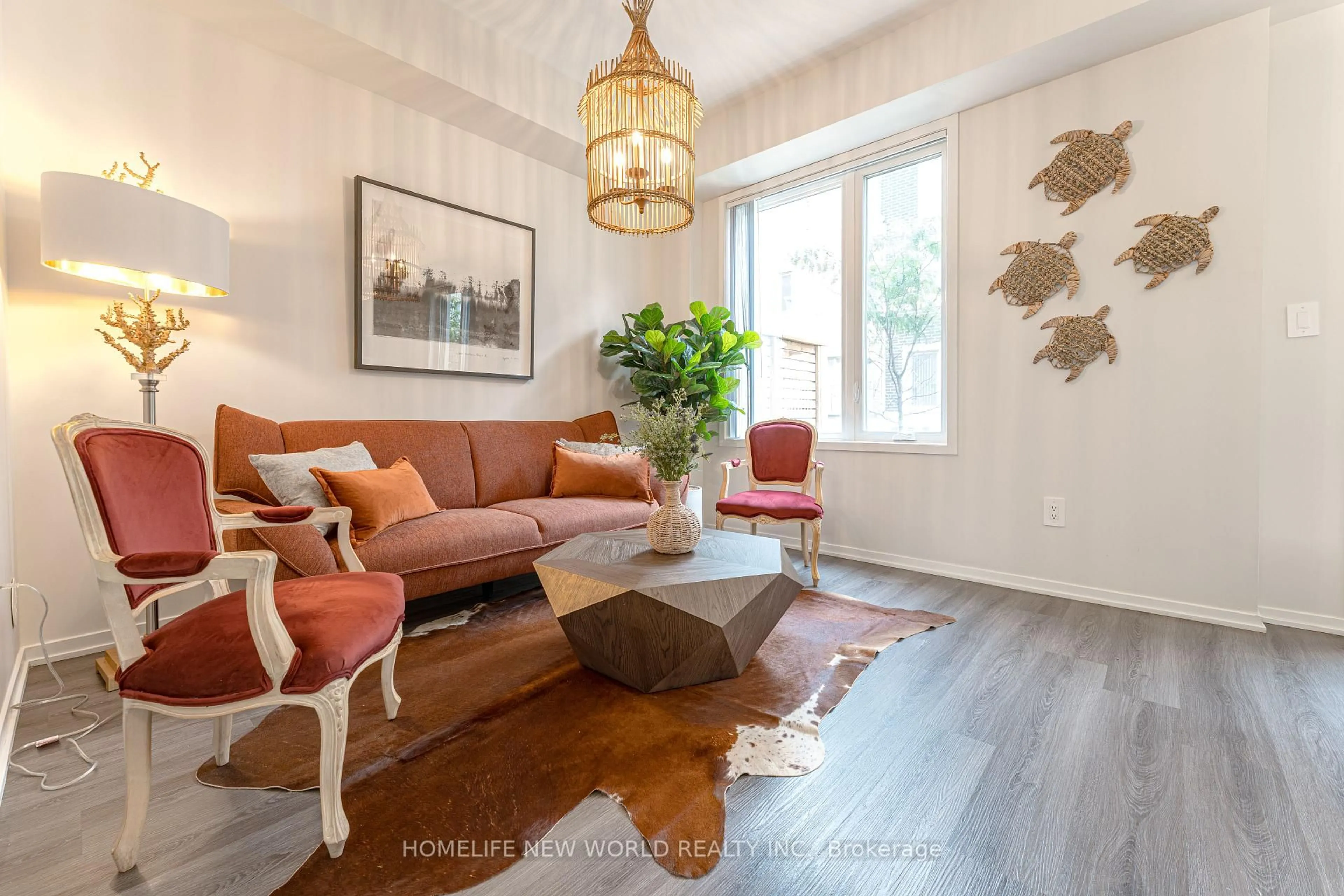 Living room with furniture, wood/laminate floor for 67 Mable Smith Way, Vaughan Ontario L4K 0N6