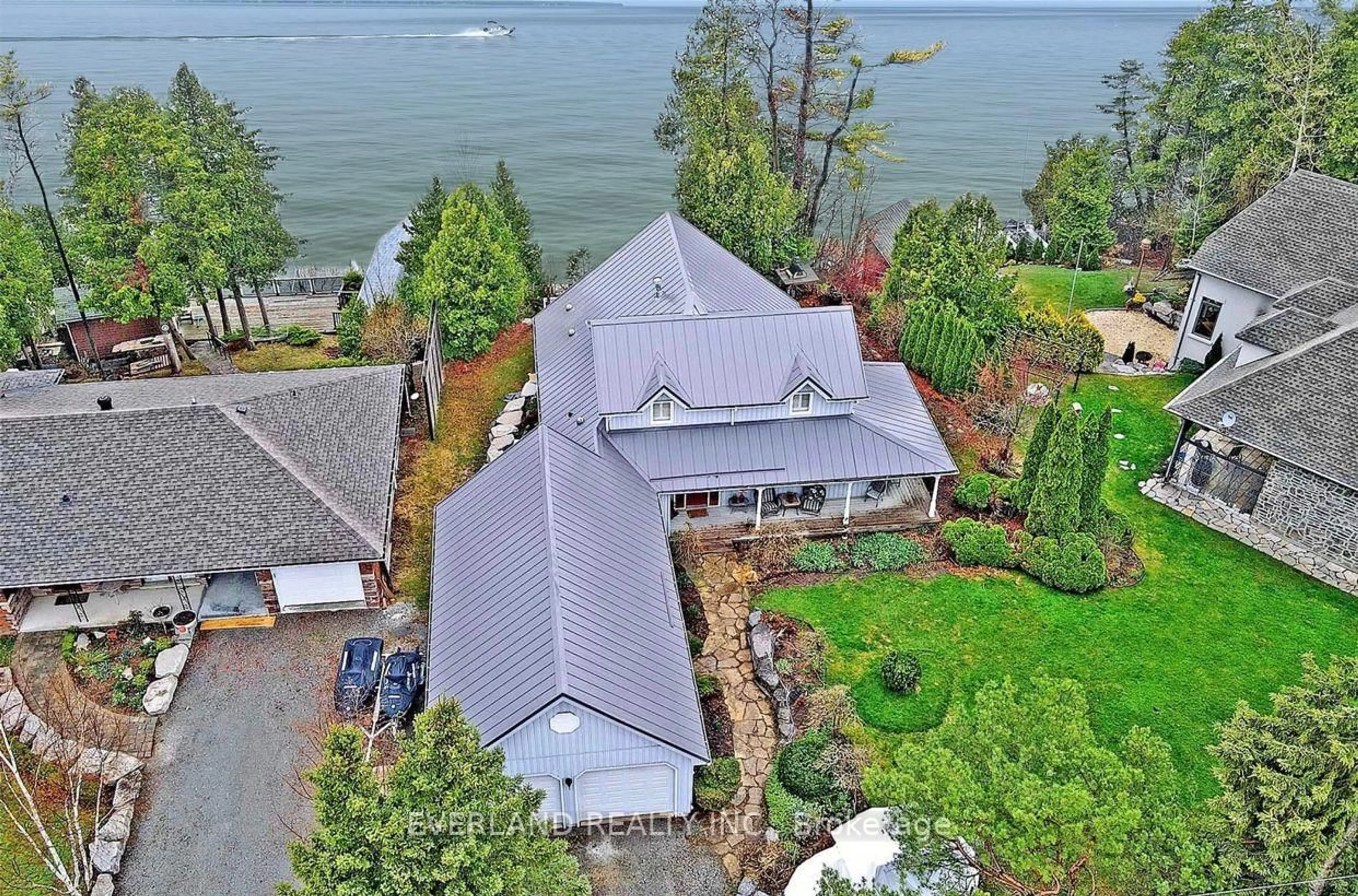 A pic from outside/outdoor area/front of a property/back of a property/a pic from drone, water/lake/river/ocean view for 24940 Thorah Park Blvd, Brock Ontario L0K 1A0