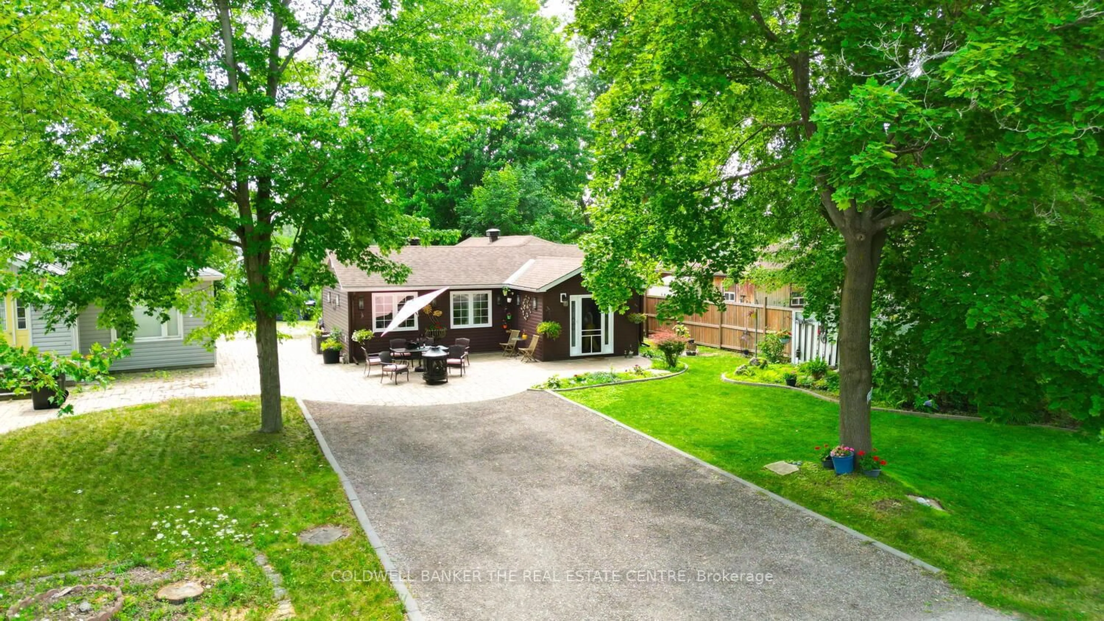 A pic from outside/outdoor area/front of a property/back of a property/a pic from drone, street for 1127 Shore Acres Dr, Innisfil Ontario L0L 1R0