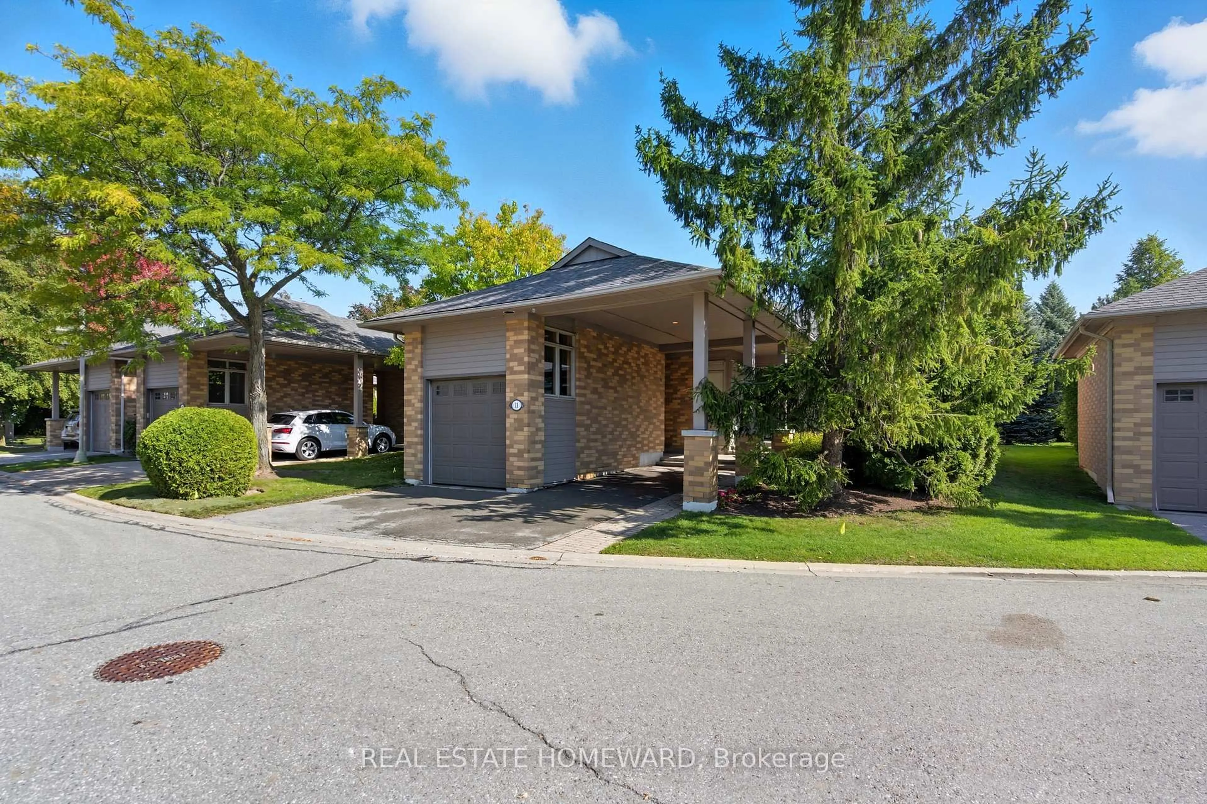 Home with brick exterior material, street for 11 Loon Harbour Way, Markham Ontario L6E 1B4